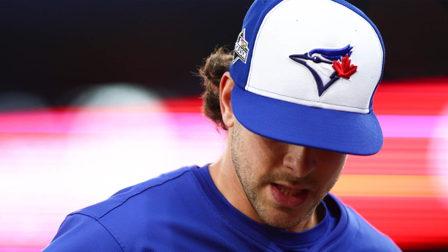 Ernie Clement wearing a Blue Jays hat