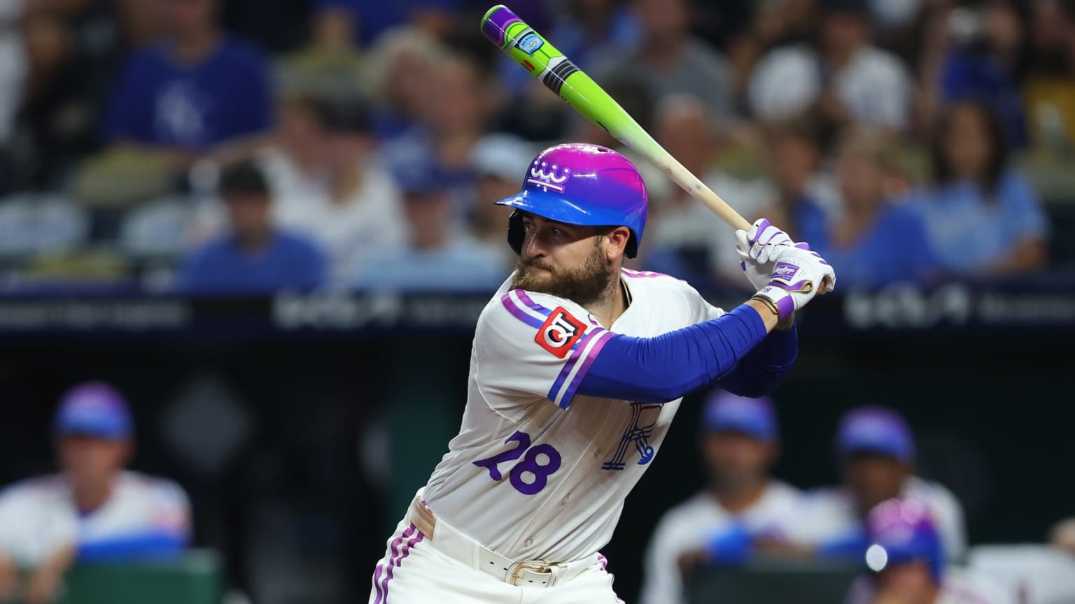 Kyle Isbel at the plate with a Buzz Lightyear bat