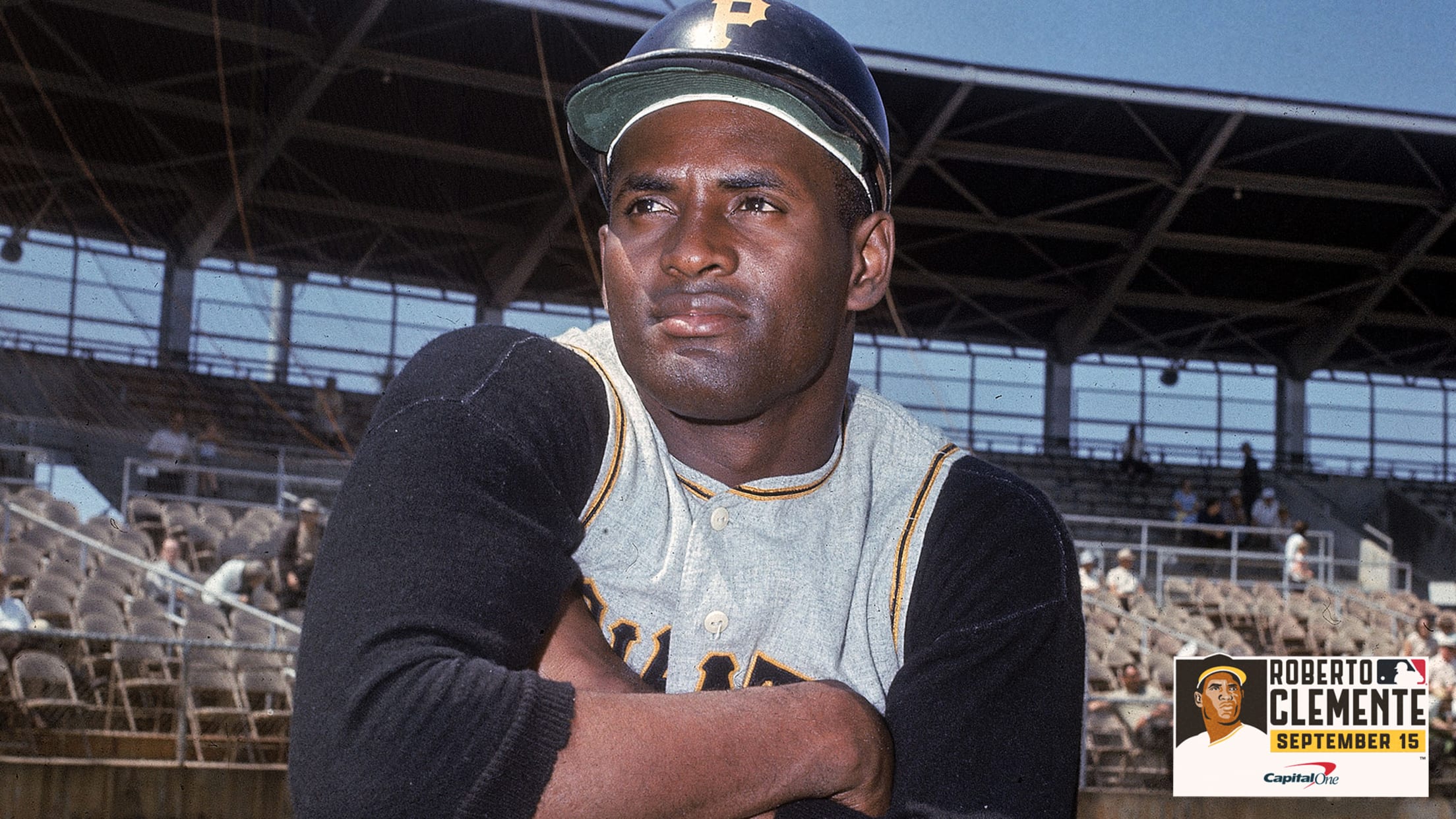 Roberto Clemente poses on a sunny day