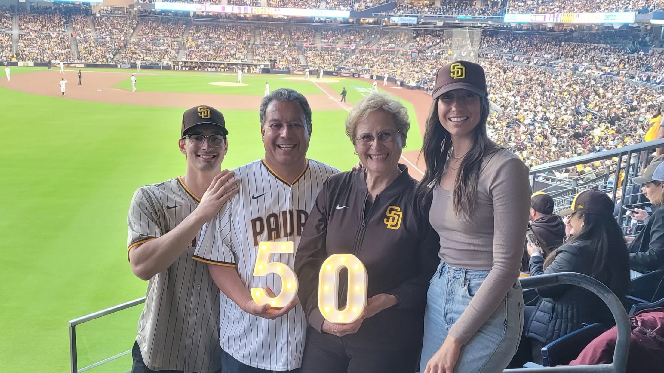 Carole Salazar and her son Vic have been to every Padres Opening Day since 1974