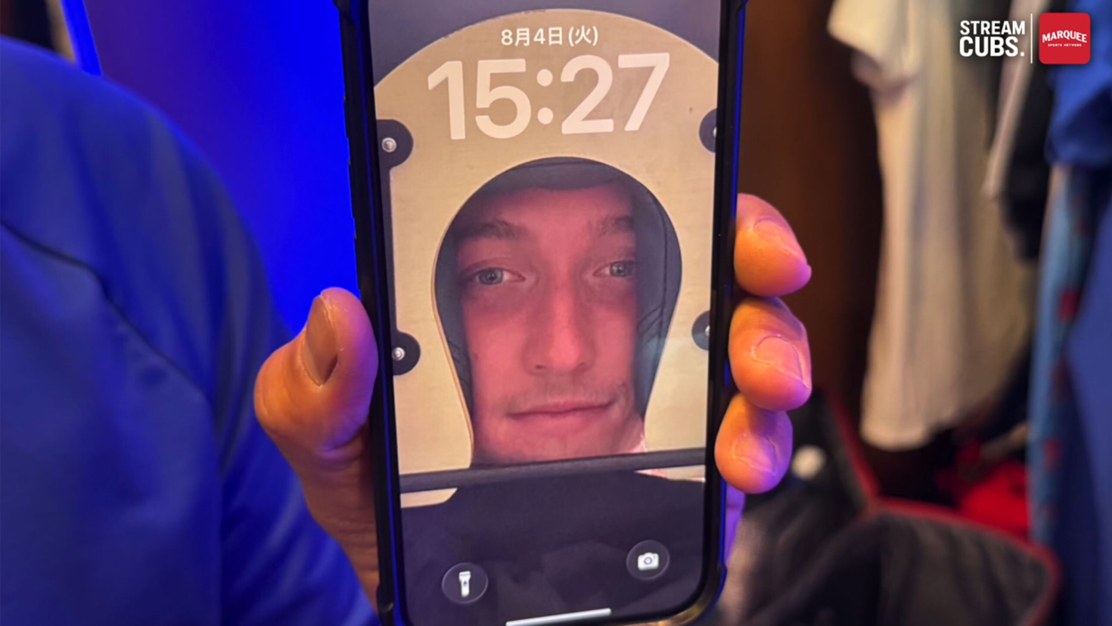 An image of Ben Brown's face on Shota Imanaga's phone