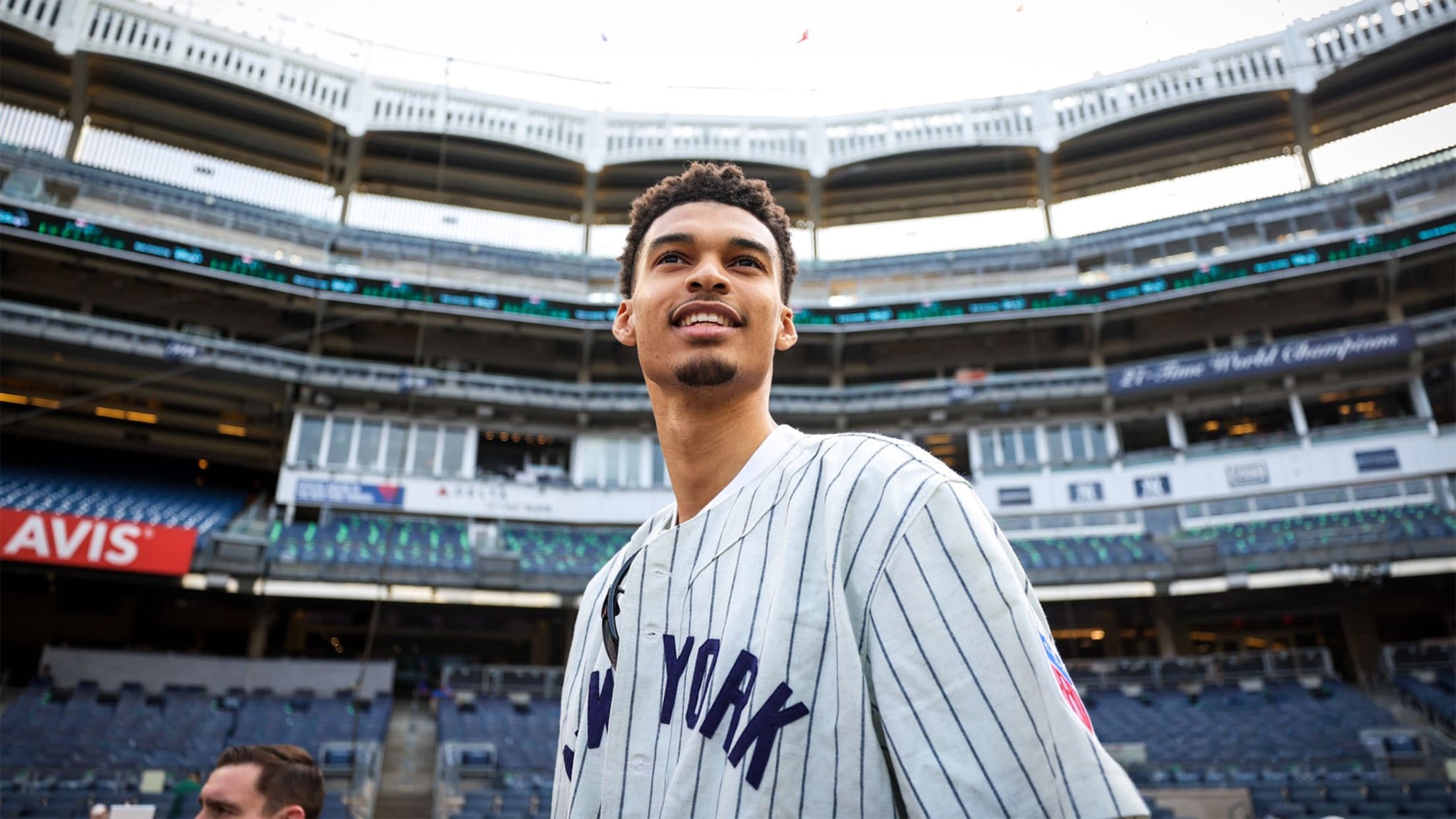 Victor Wembanyama in a Yankees jersey at Yankee Stadium