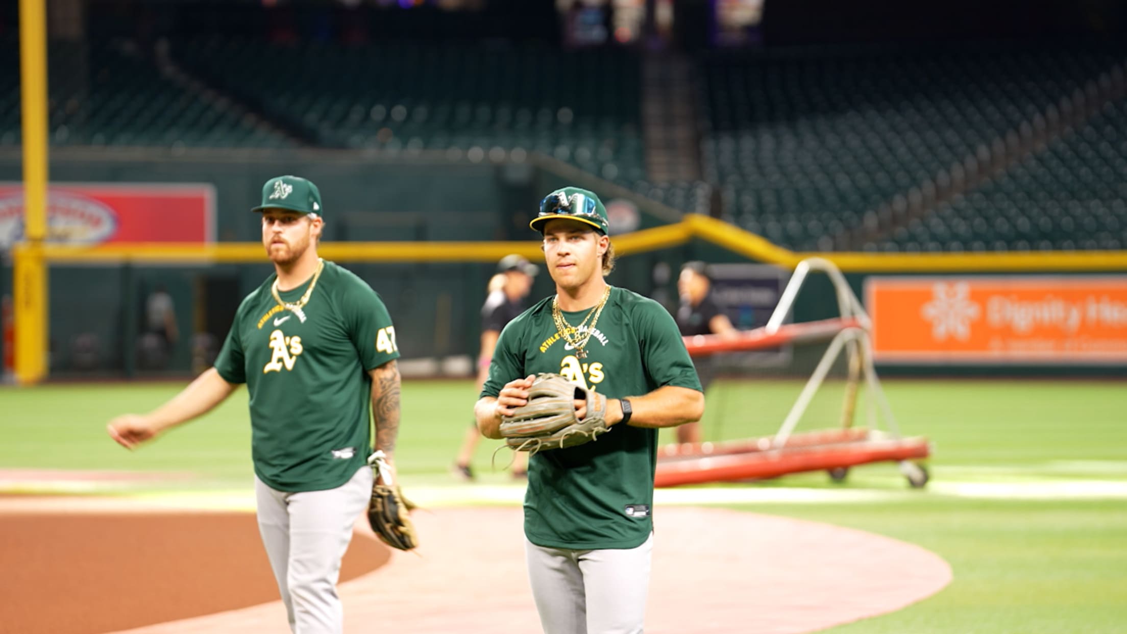 A's host Drew Burress for pregame workout with team