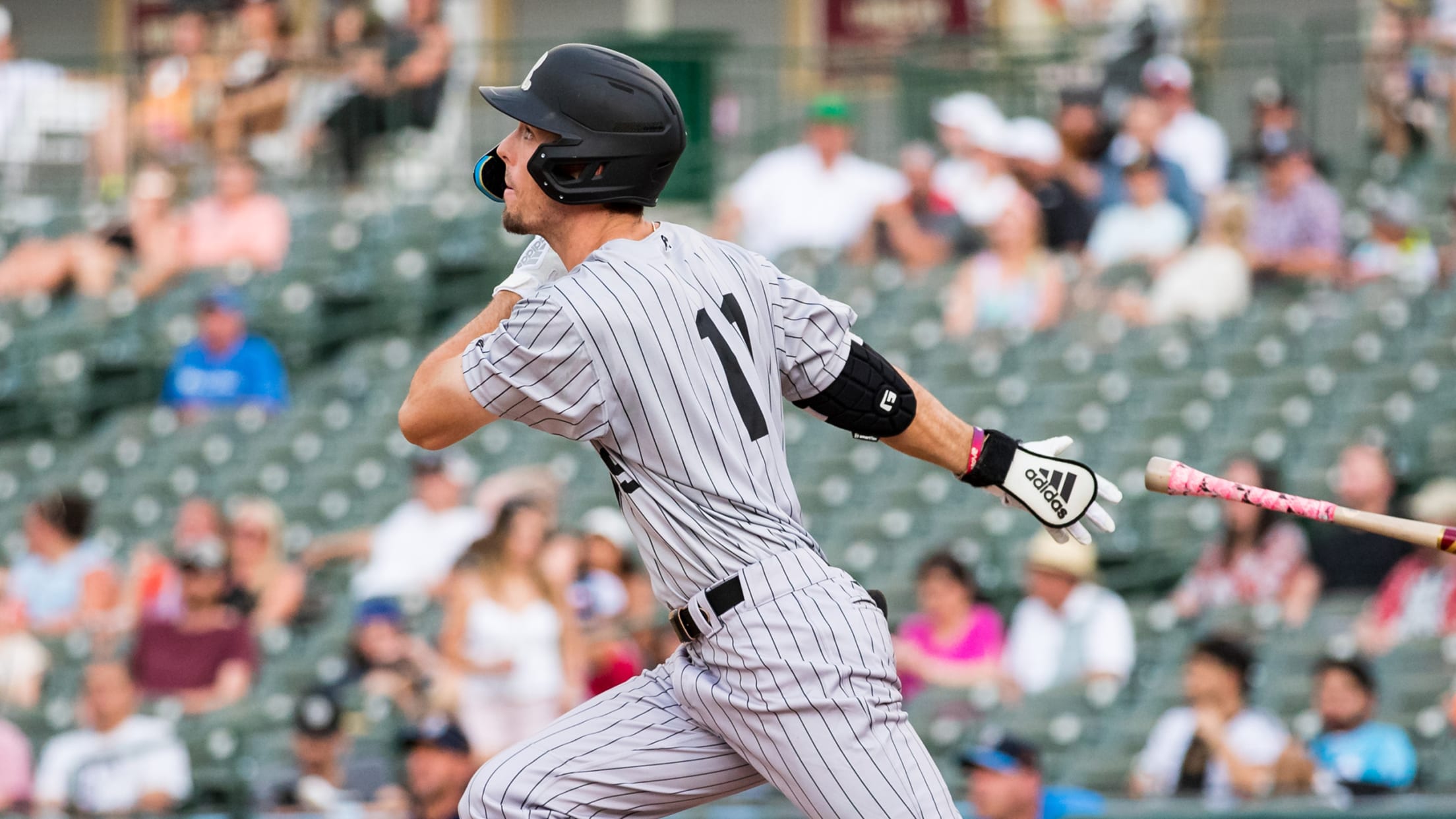 Evan Carter follows through on a swing