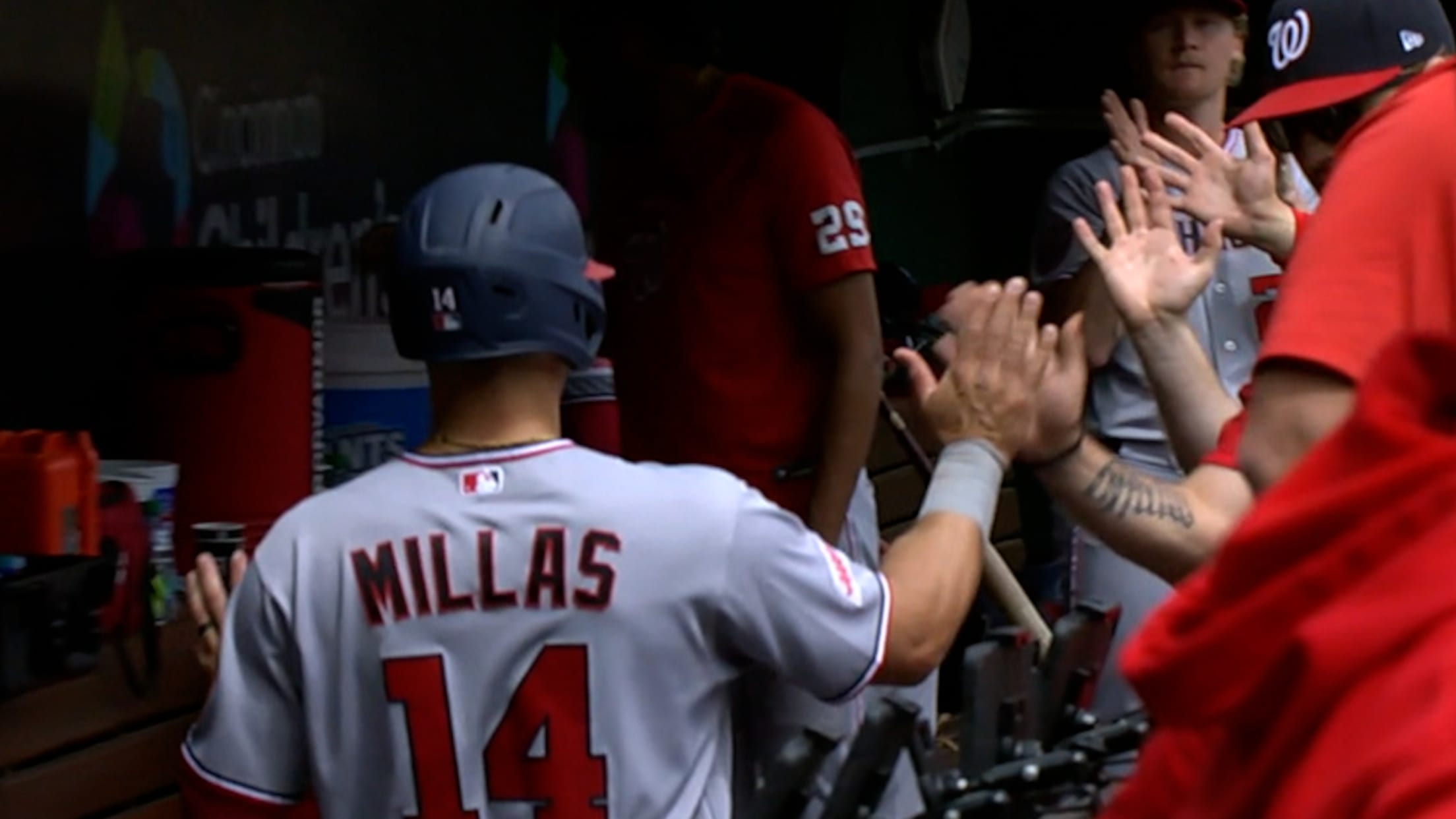 Drew Millas scores on a wild pitch