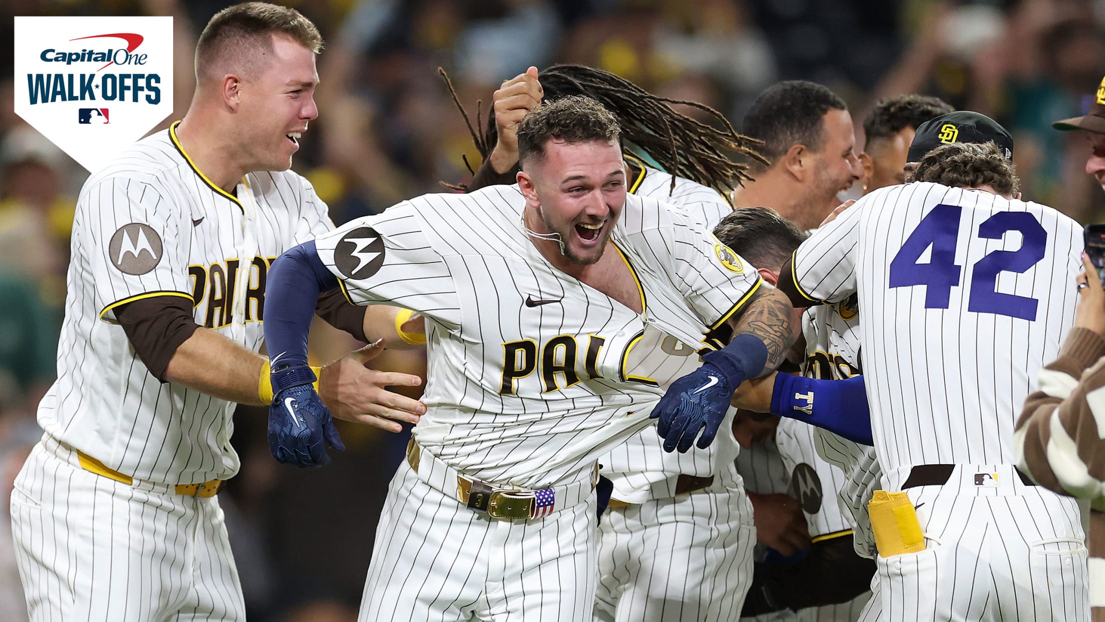 The Padres celebrate Jackson Merrill's walk-off hit