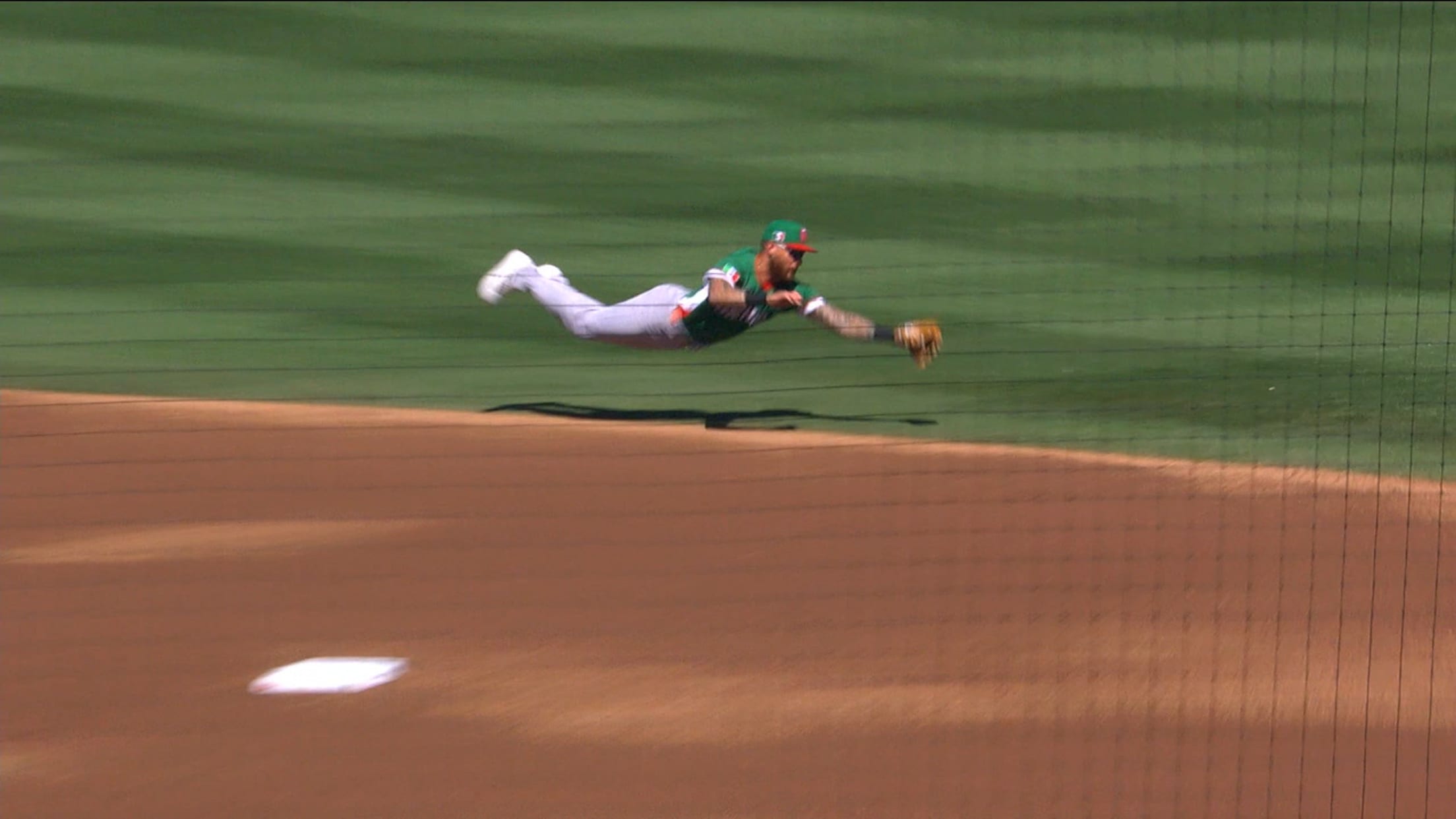 Joey Ortiz lays out to make a great diving grab