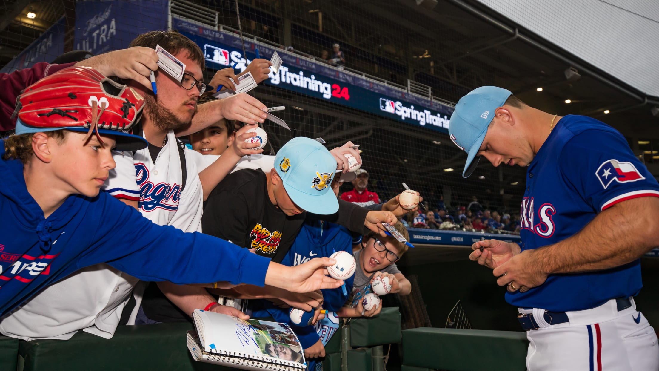 Wyatt Langford signing autographs