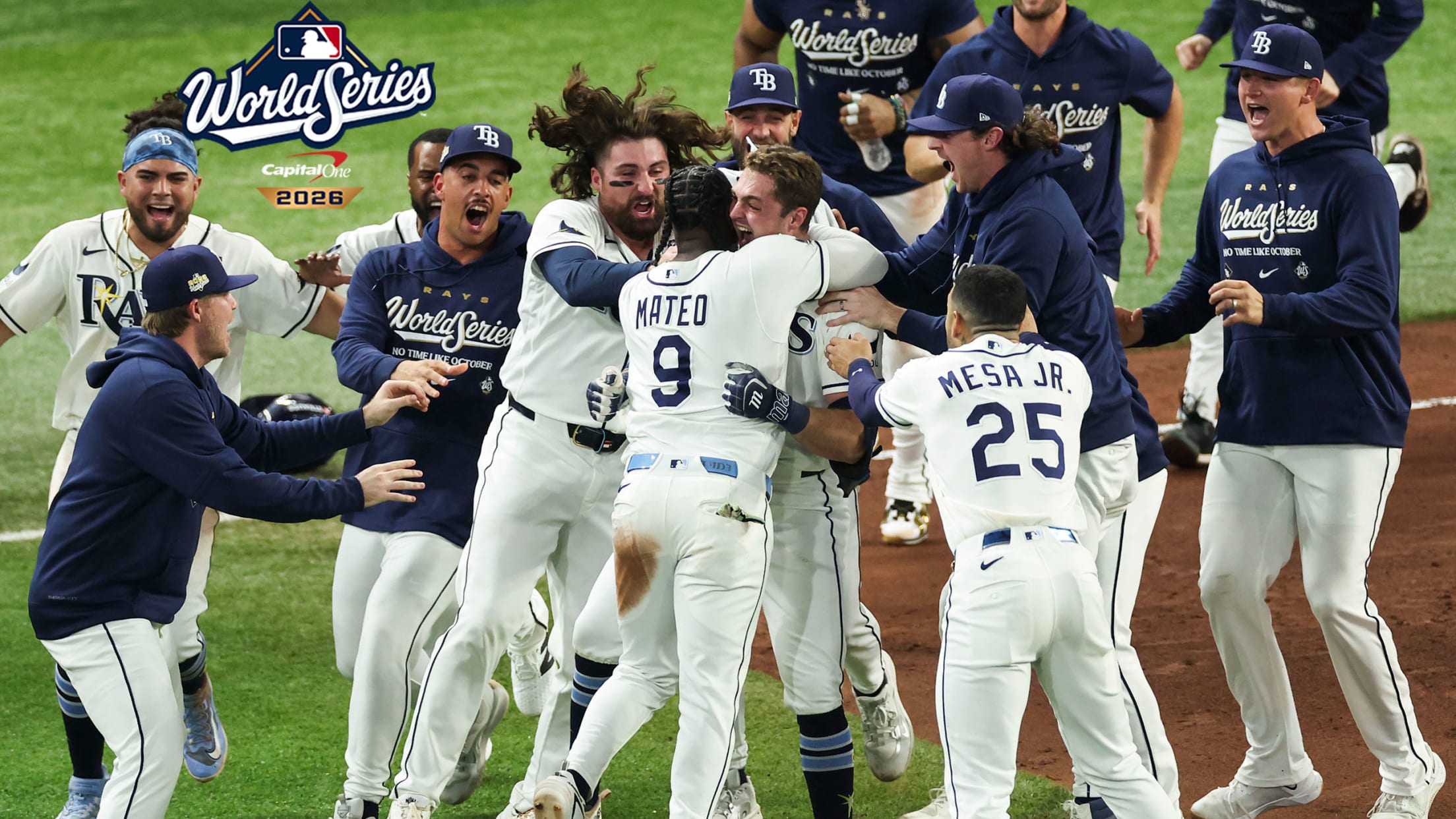 The Rays celebrate their walk-off win by mobbing Ben Williamson on the field
