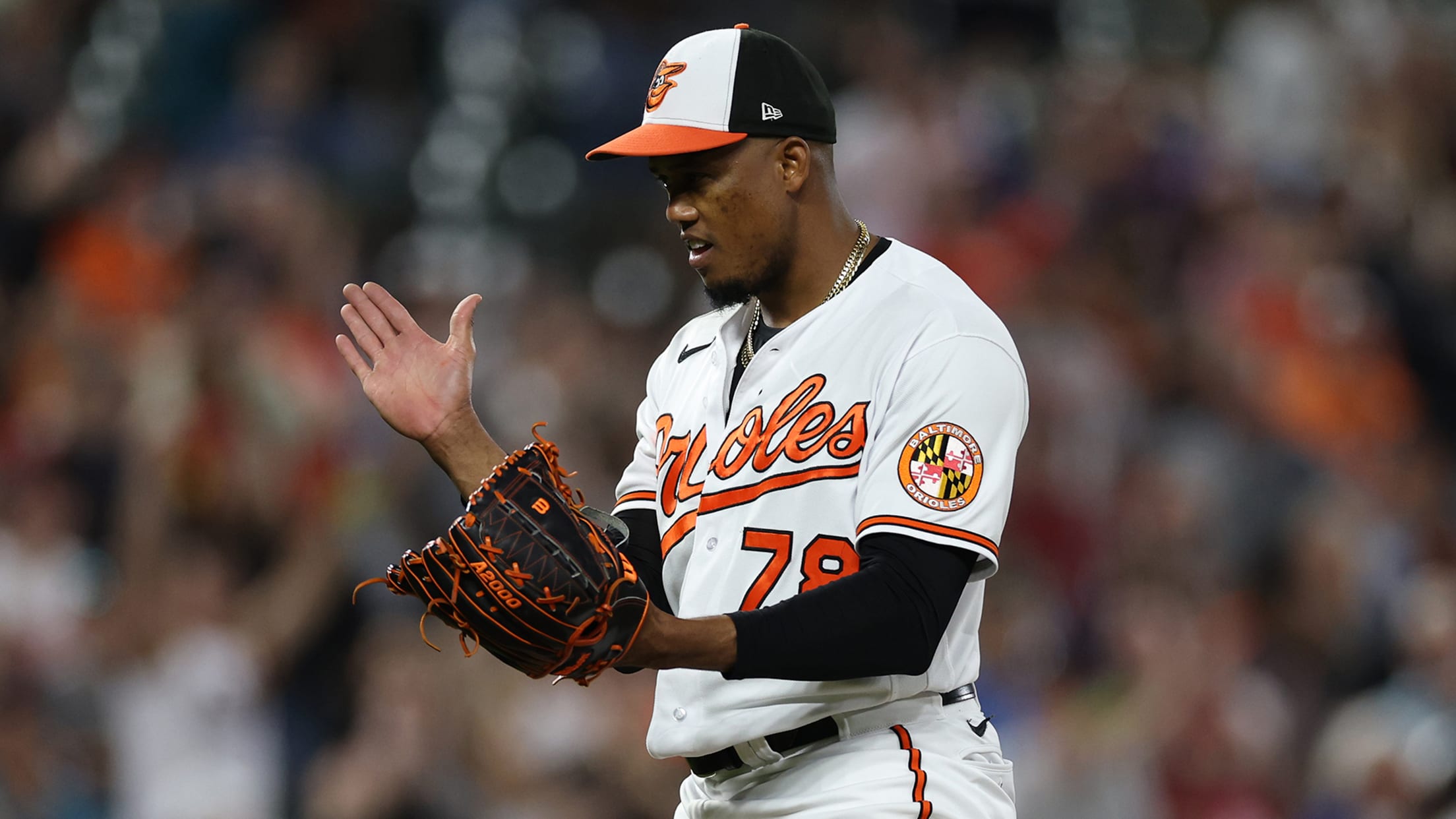 Yennier Cano claps into his glove