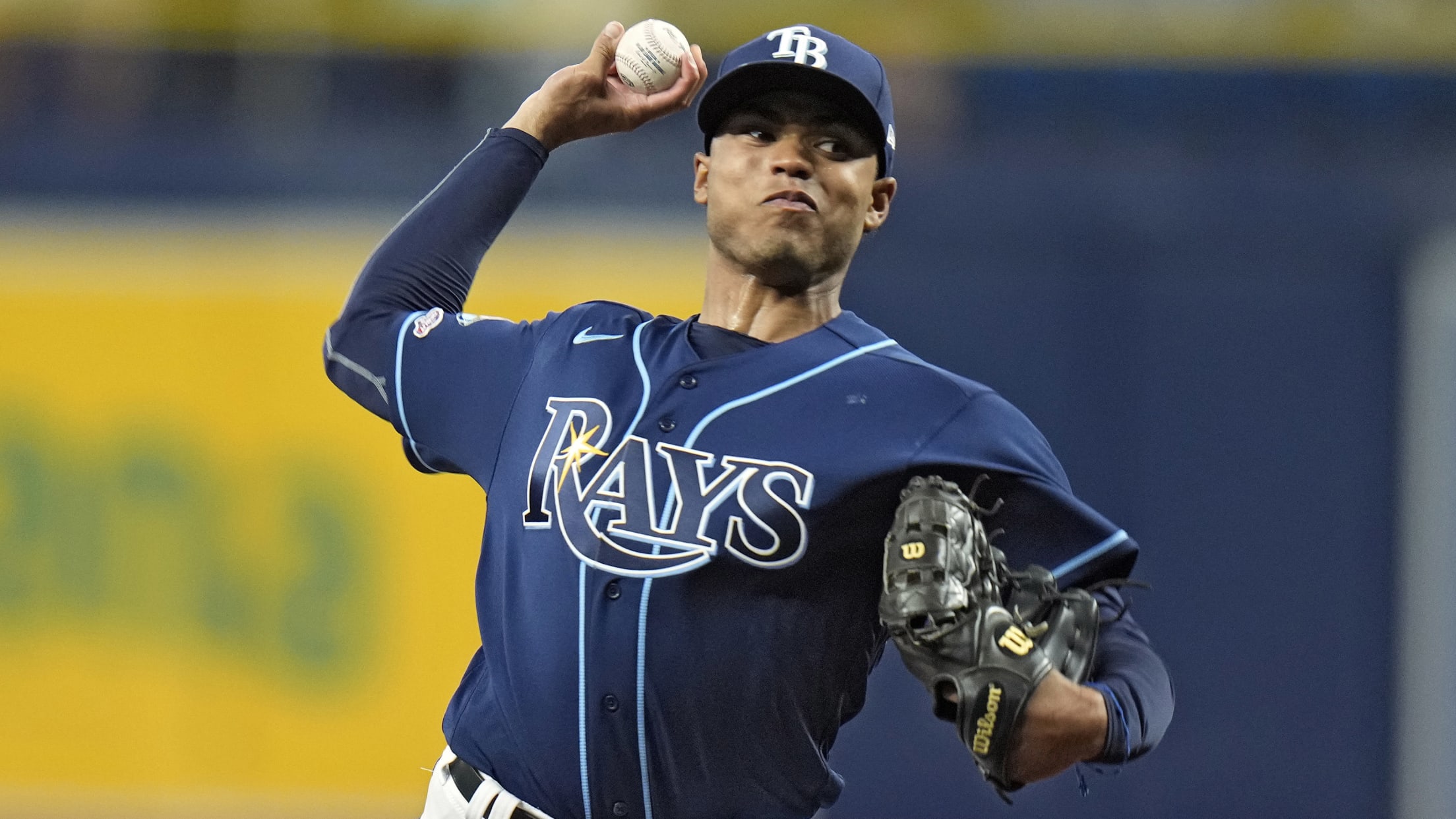 Taj Bradley delivers a pitch in his MLB debut