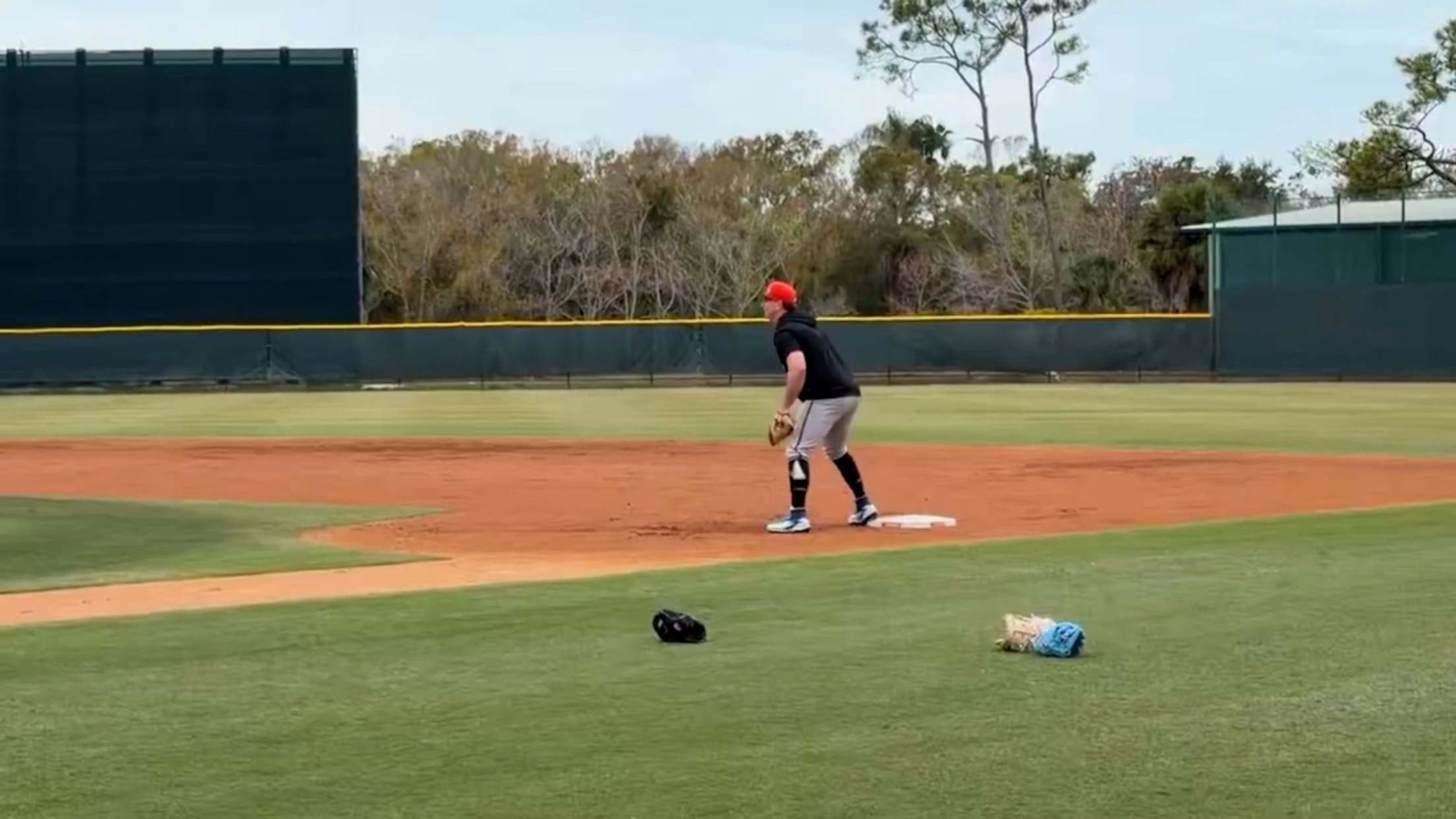 Pete Alonso warms up at first base at Spring Training