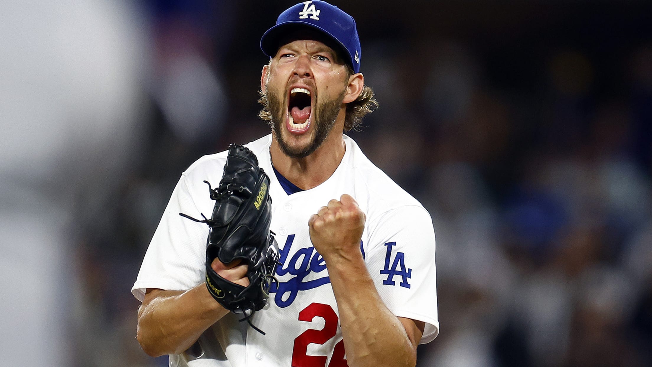 Clayton Kershaw pumps his fist and screams