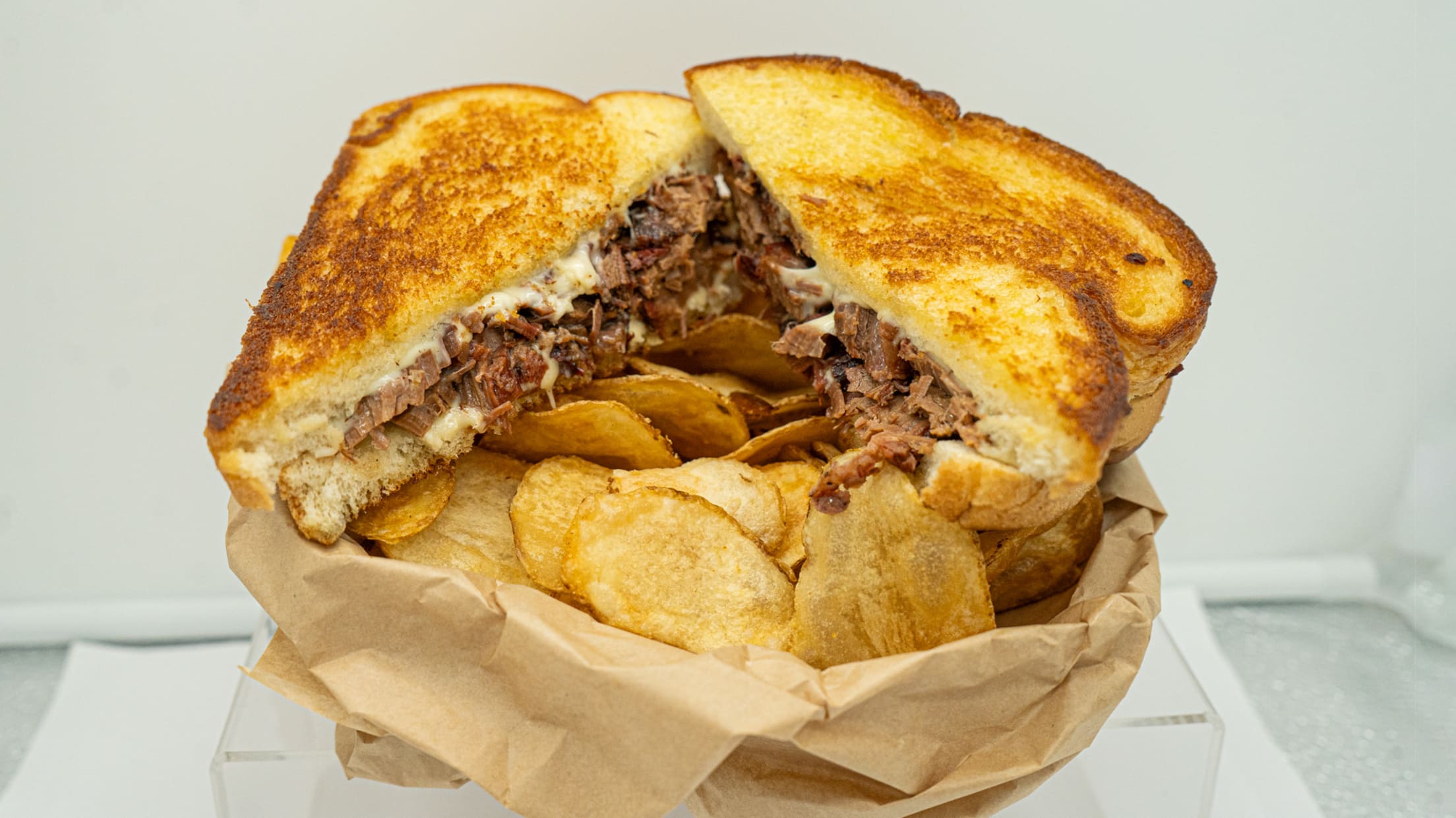 OMA cheesy brisket sammy