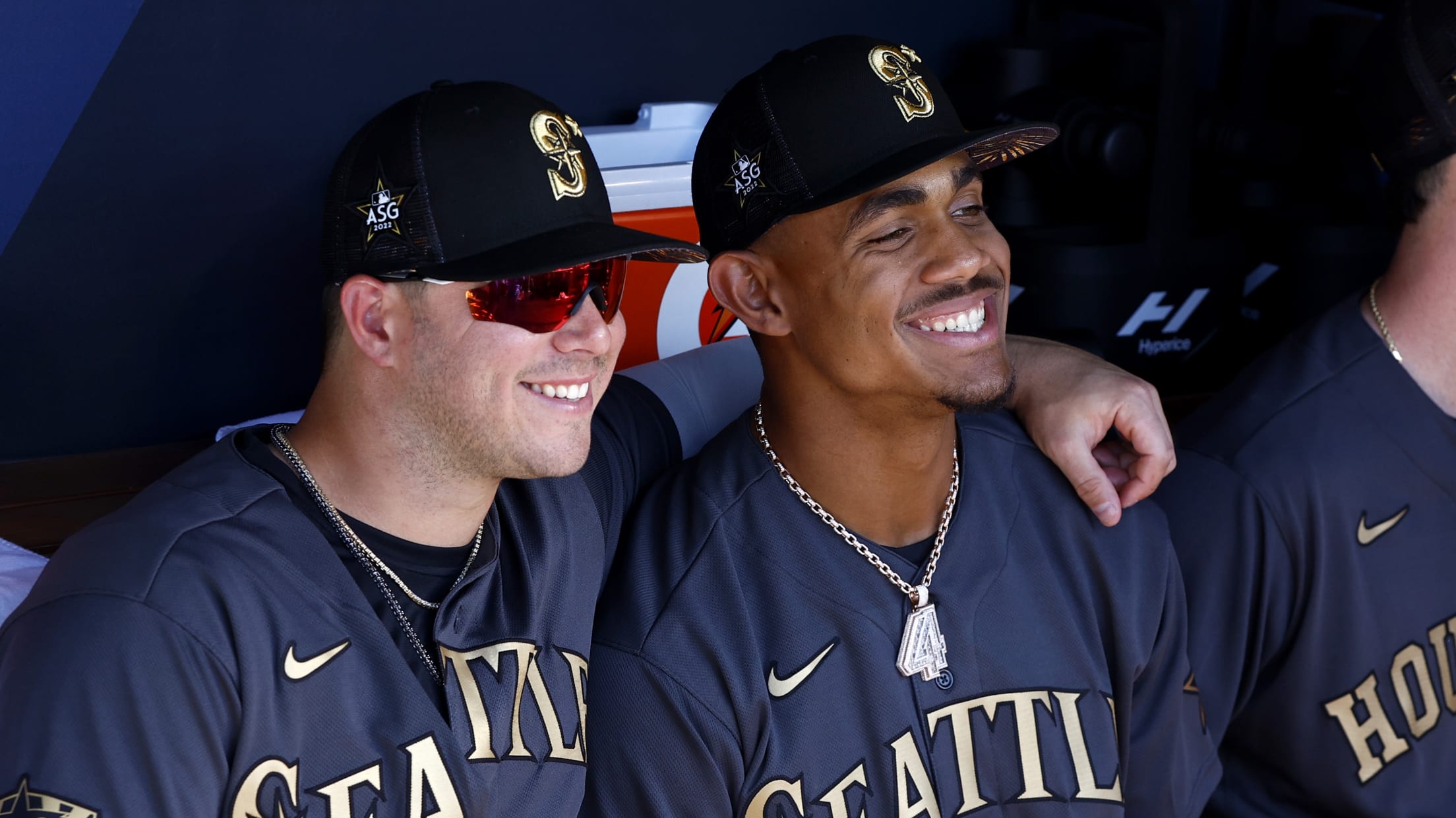 Seattle Mariners' Ty France removes his batting gear after