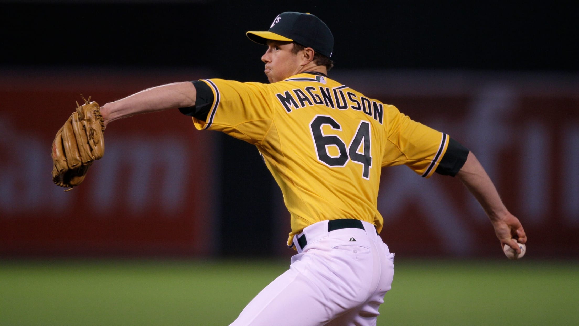 Trystan Magnuson pitching for the A's