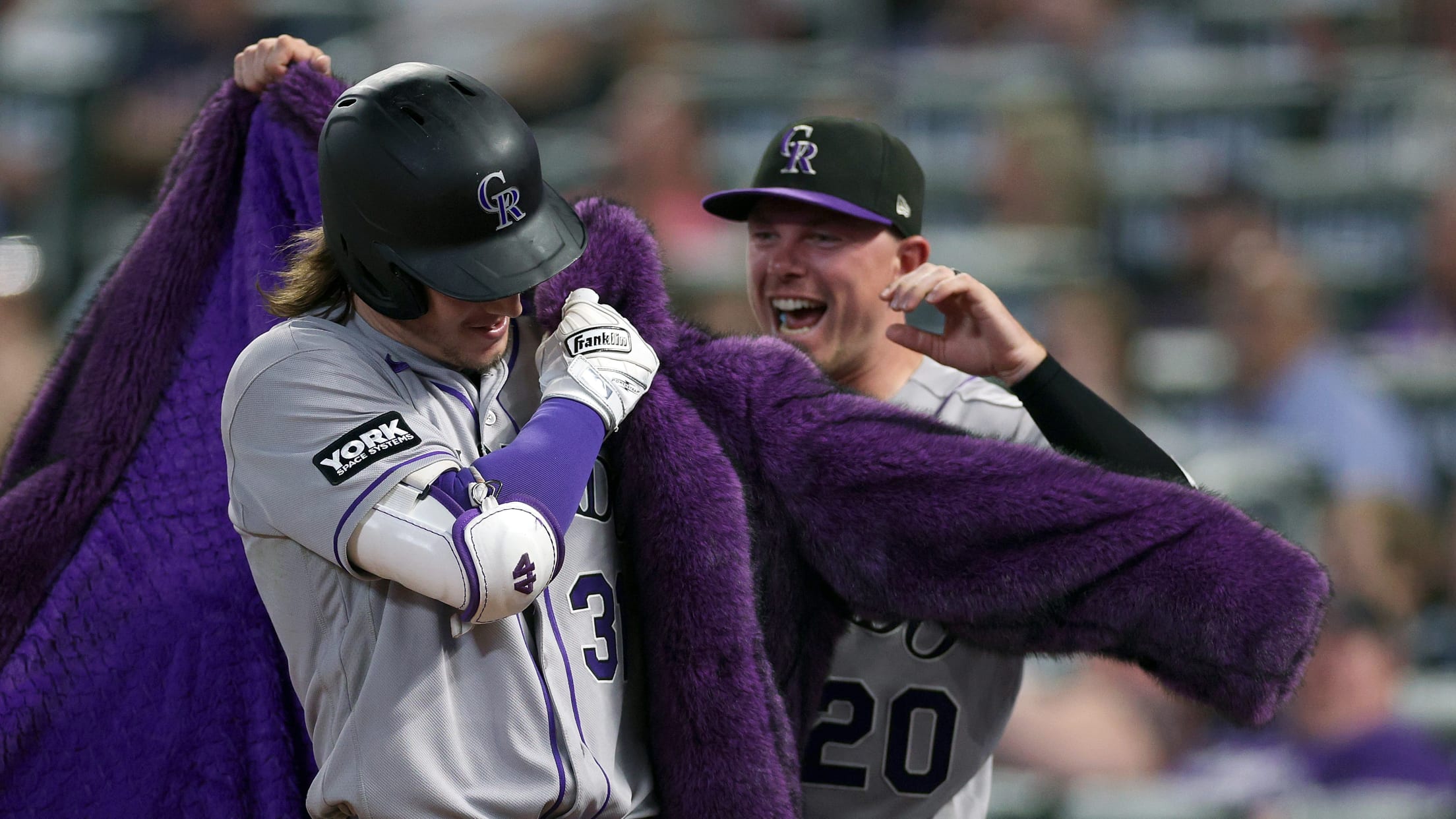The Rockies push across five runs in the 9th