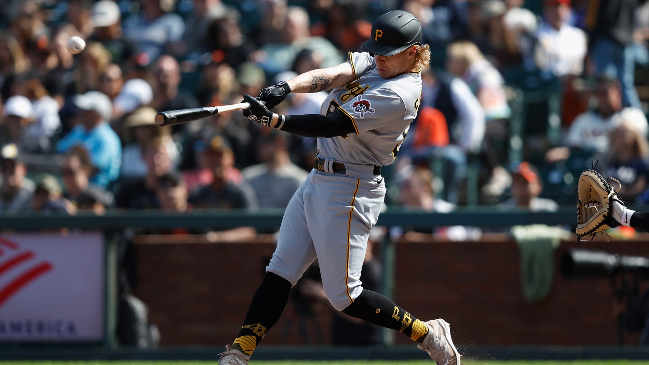 Jack Suwinski swinging at a pitch