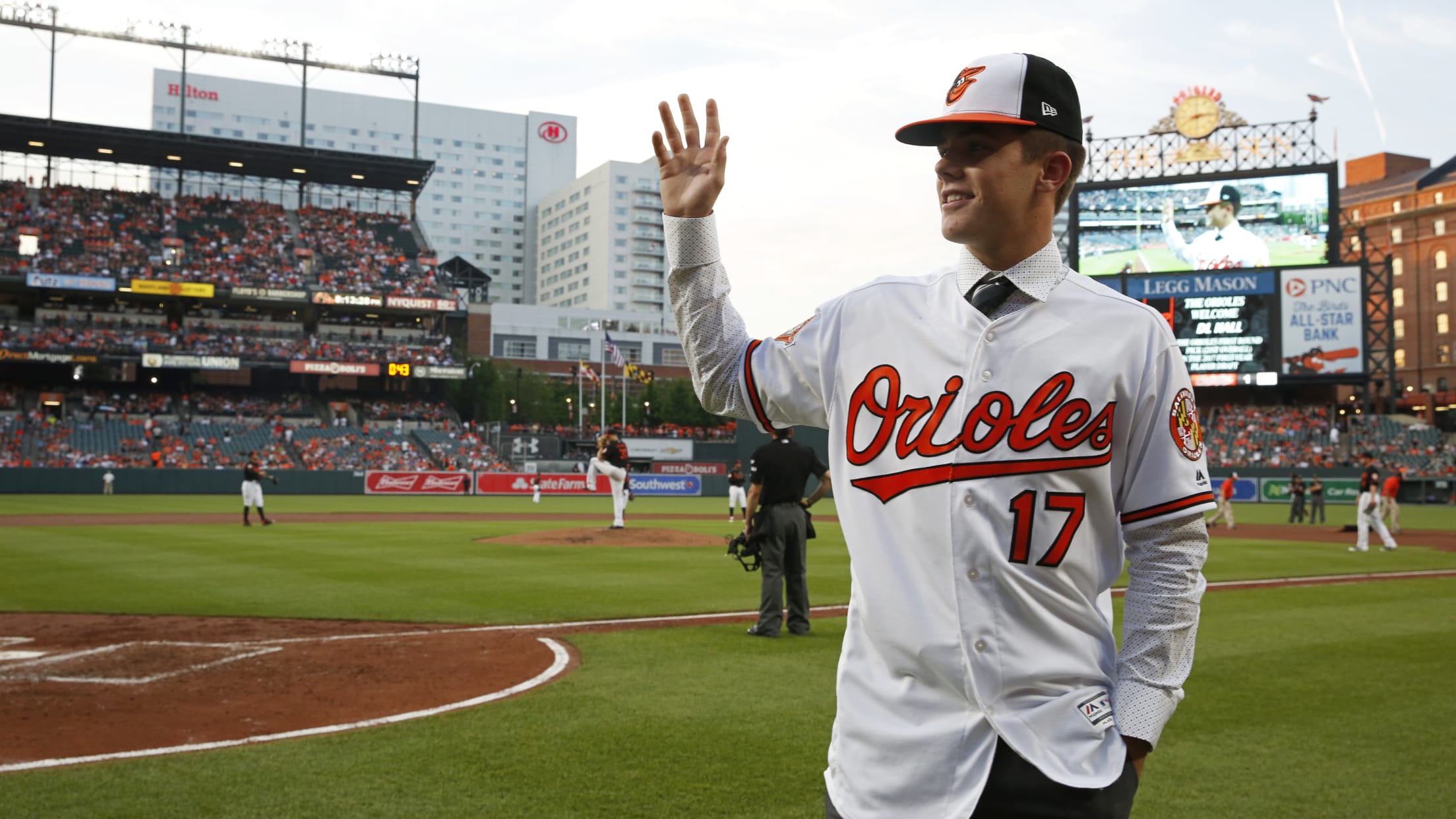 Hall waving to fans during the game in 2017. Hall had earlier signed his paperwork to play for the Baltimore Orioles.