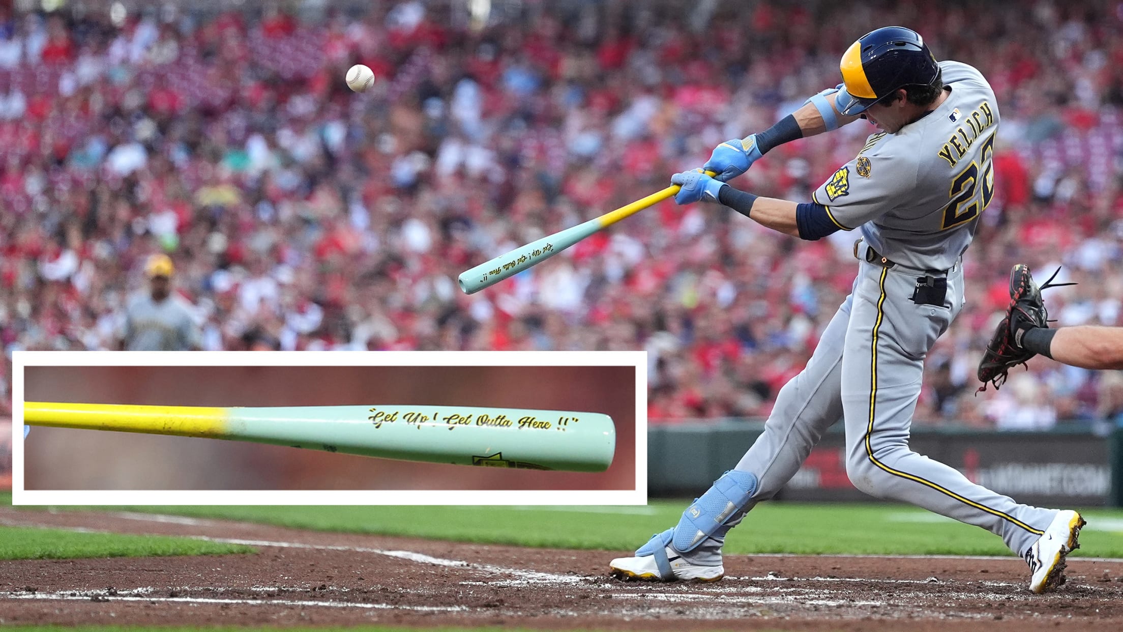 Christian Yelich hits a home run with a custom bat honoring Bob Uecker, with an inset of the bat
