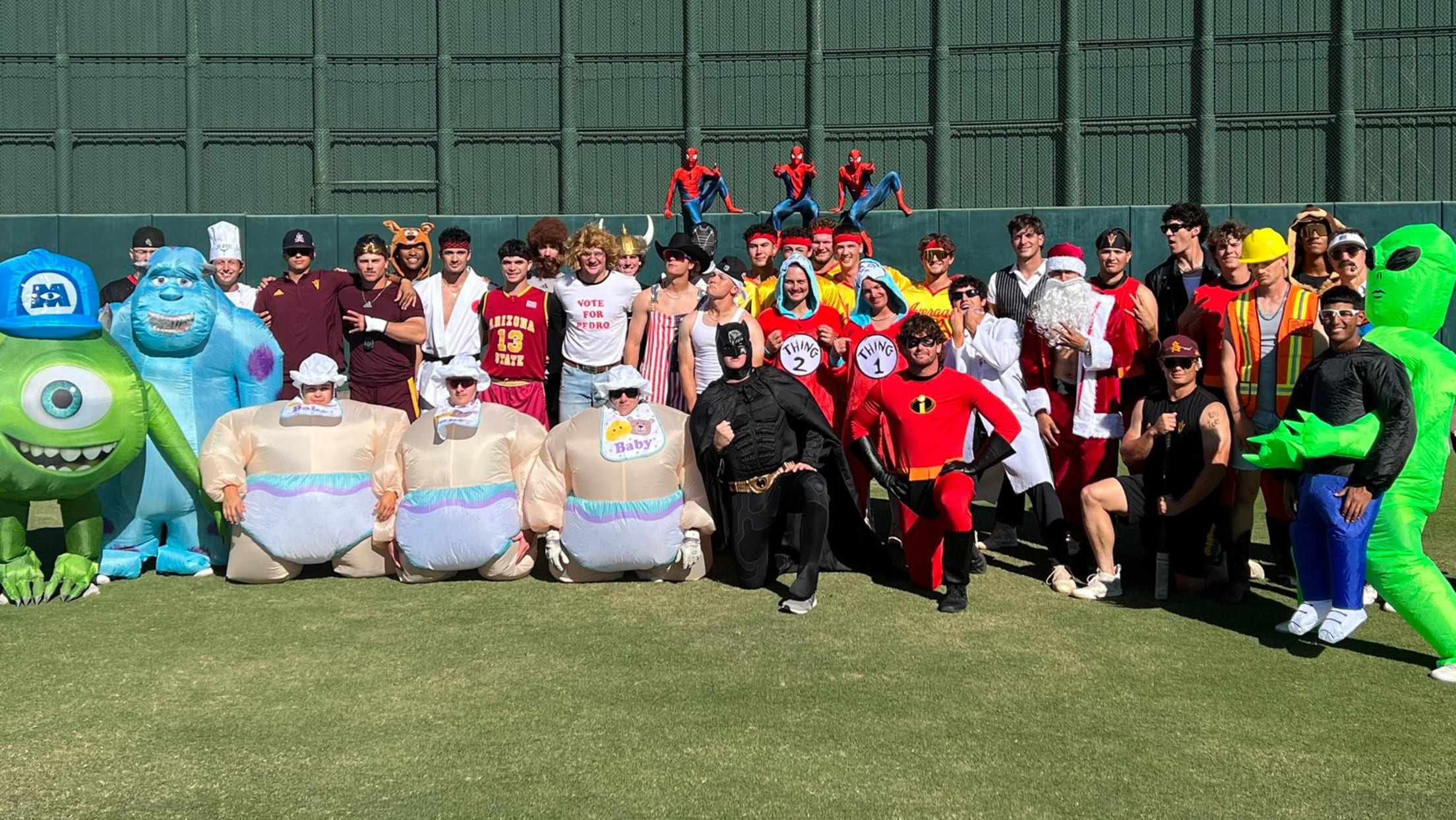 A group photo of a baseball team in costume