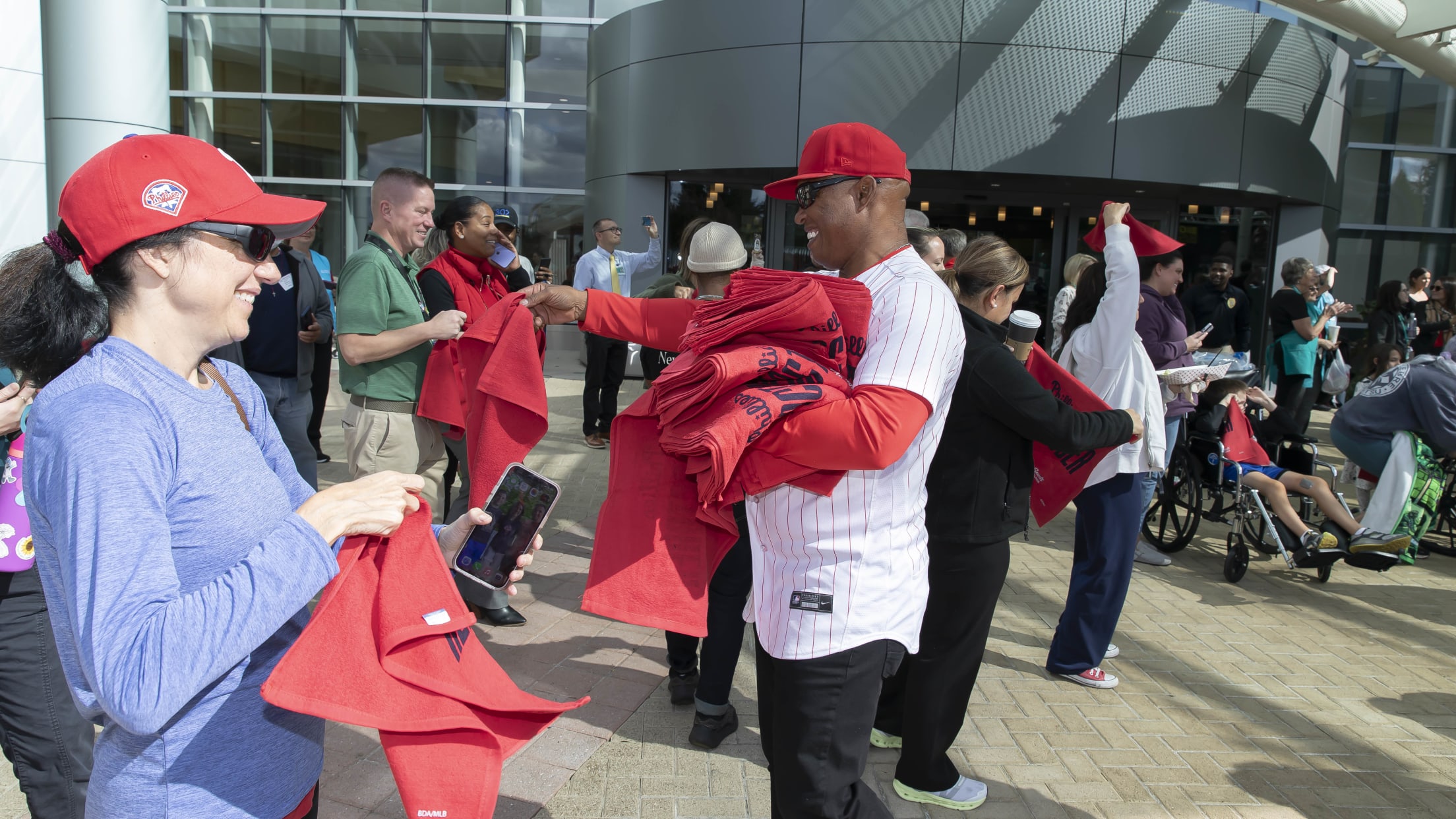 Phillies fans celebrate during Rally for Red October bus tour