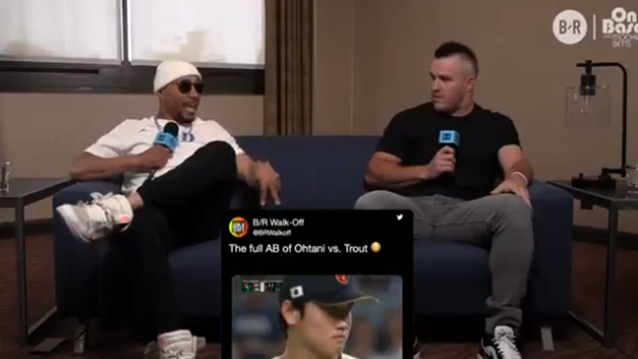 A video screenshot of Mookie Betts and Mike Trout on a couch talking