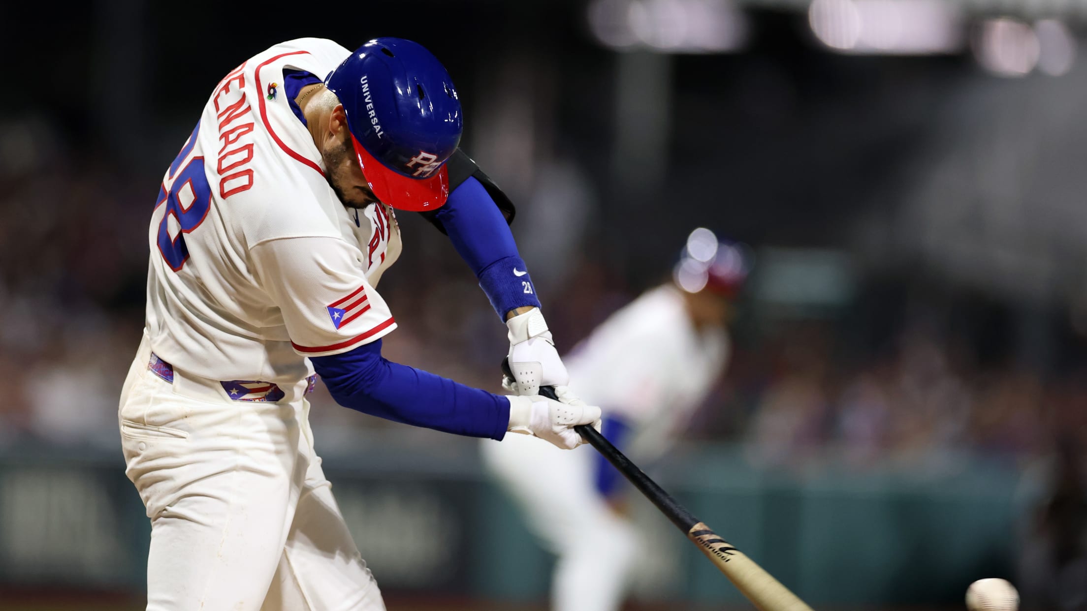 Arenado drives in a run, Clarke throws out Ramos