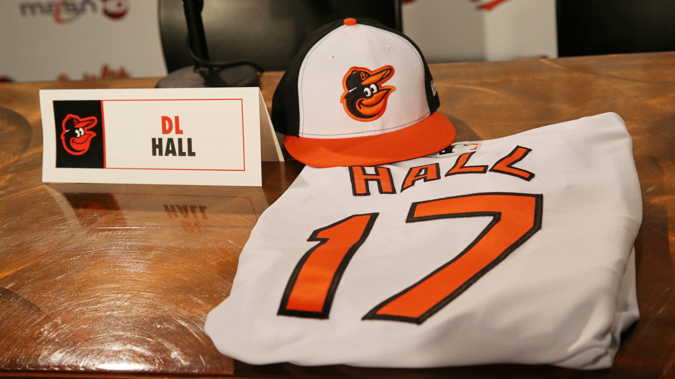 Hall's jersey and hat laid out during his draft press conference in 2017. Hall was drafted as the 21st pick in the first round by the Orioles.