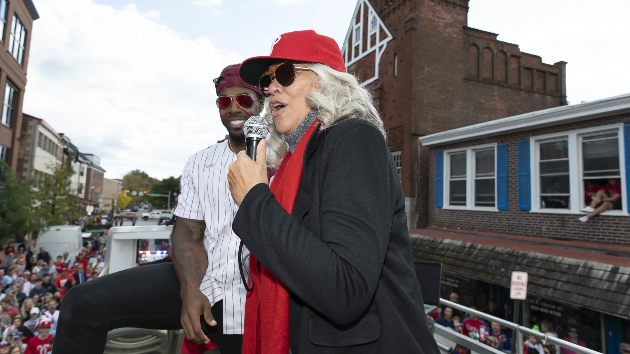 Phillies fans celebrate during Rally for Red October bus tour