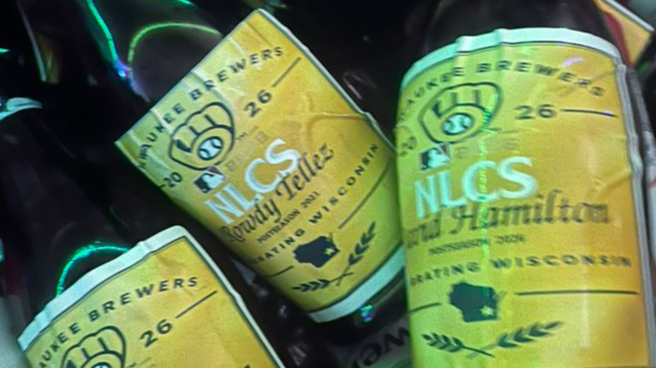 Champagne bottles with names of Brewers players on the labels