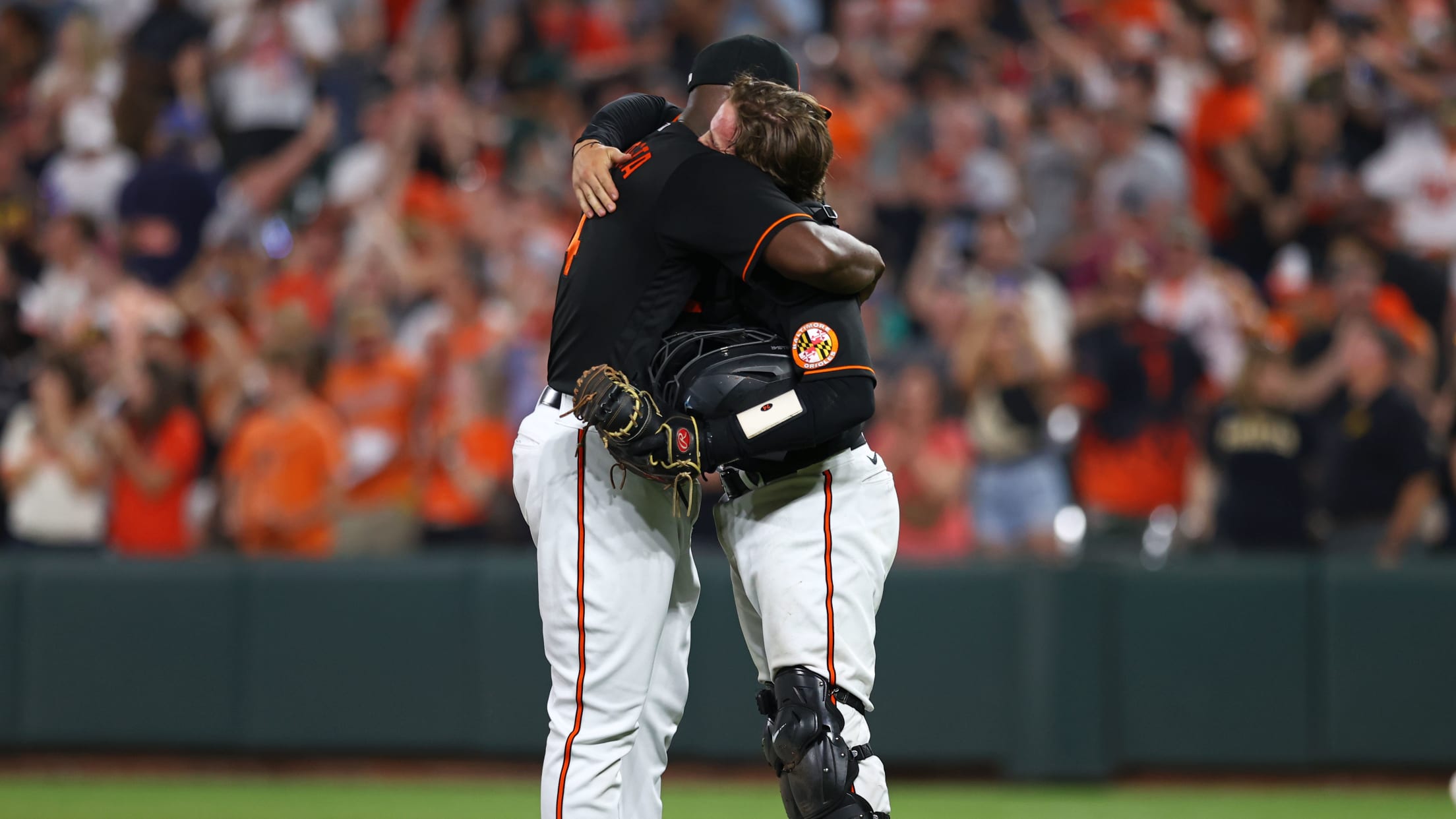 Baltimore Orioles relief pitcher Felix Bautista, right, celebrates