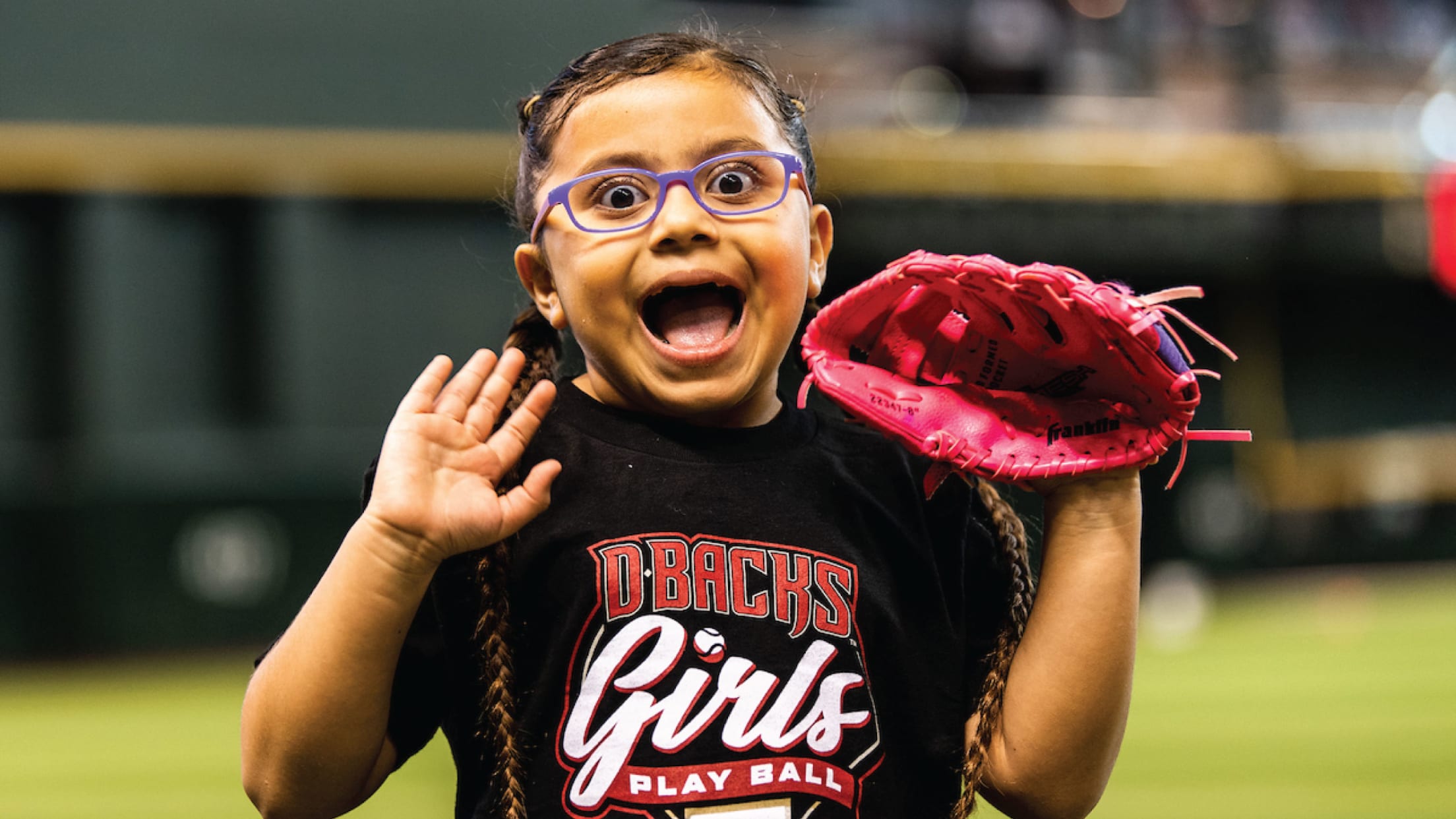 Premium Photo  Smiling, focused girl in a baseball uniform prepares for  the game. baseball training