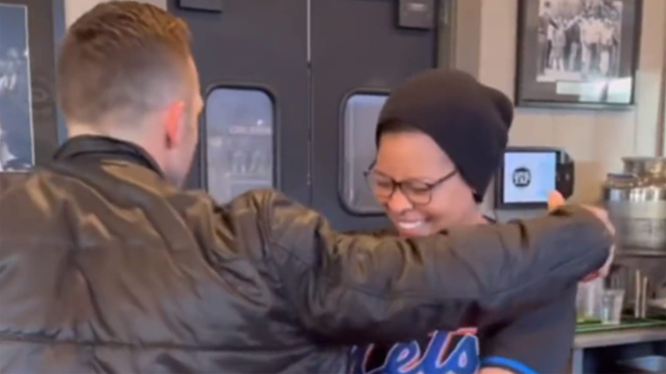 David Wright reaches out to hug a smiling fan wearing his jersey