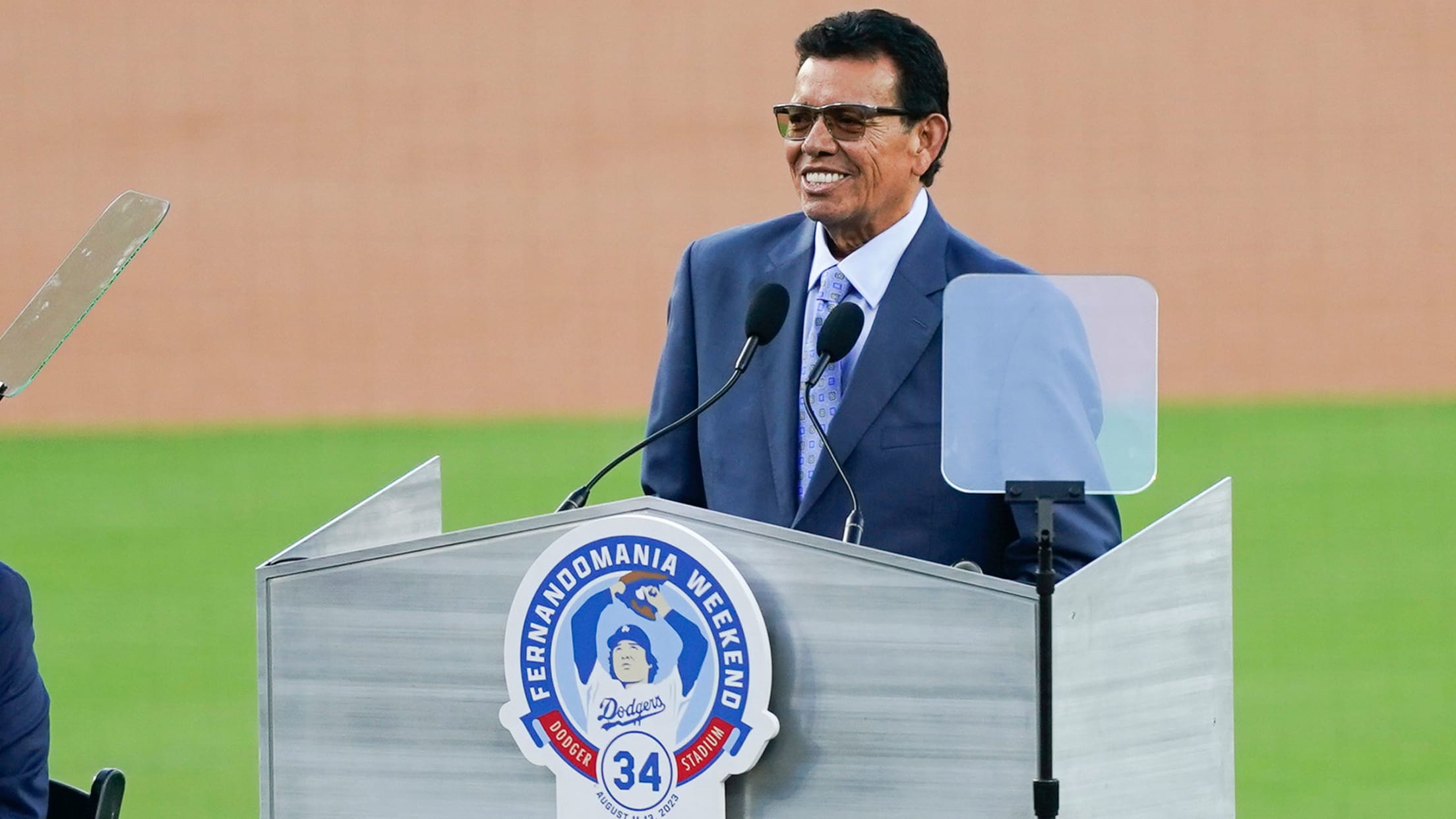 Fernando Valenzuela speaking on the field at his number retirement ceremony