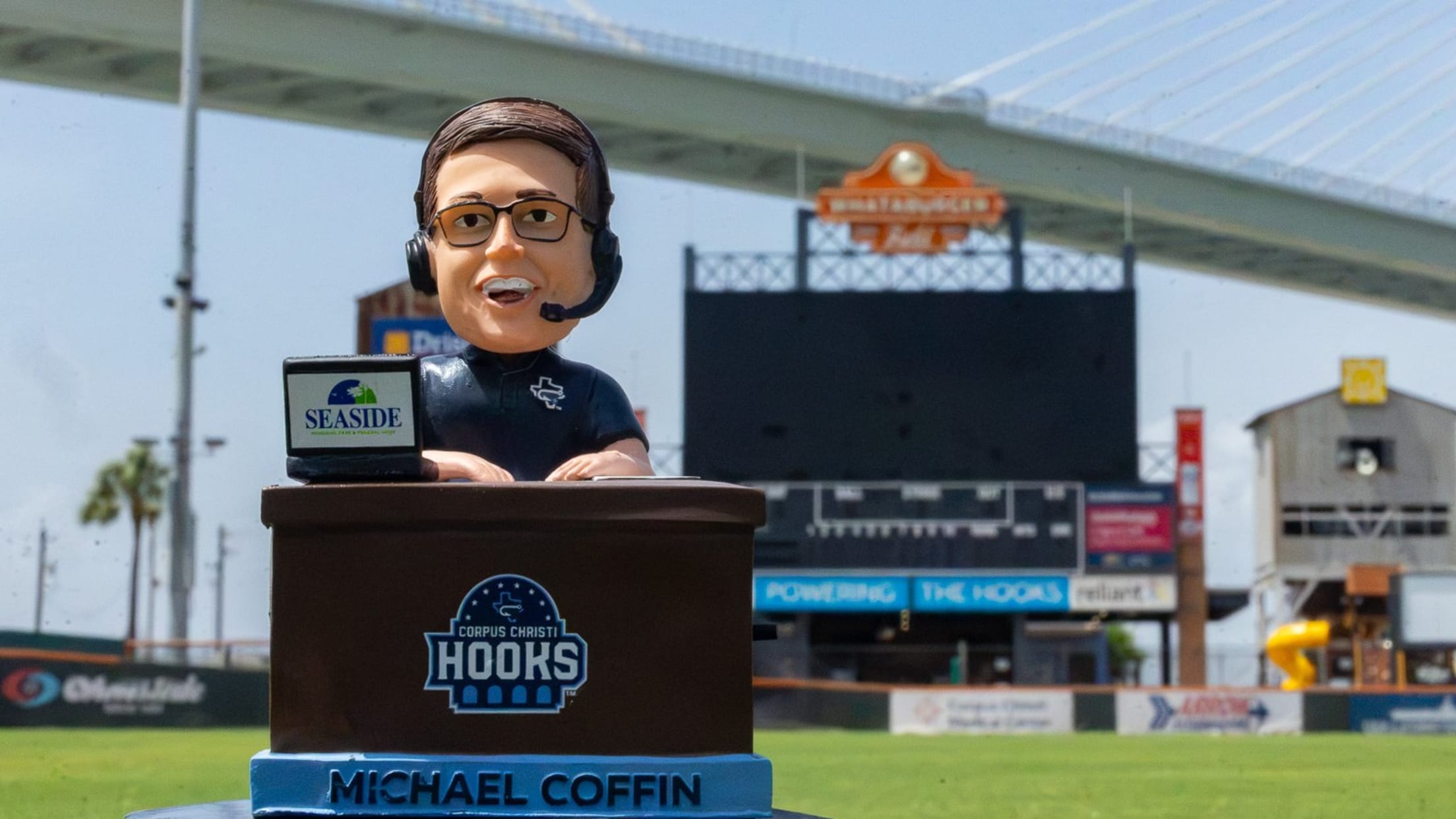 A bobblehead of broadcaster Michael Coffin