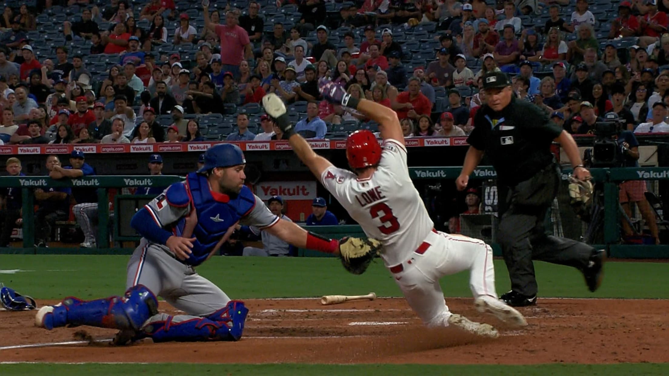 Wyatt Langford throws out Josh Lowe at home