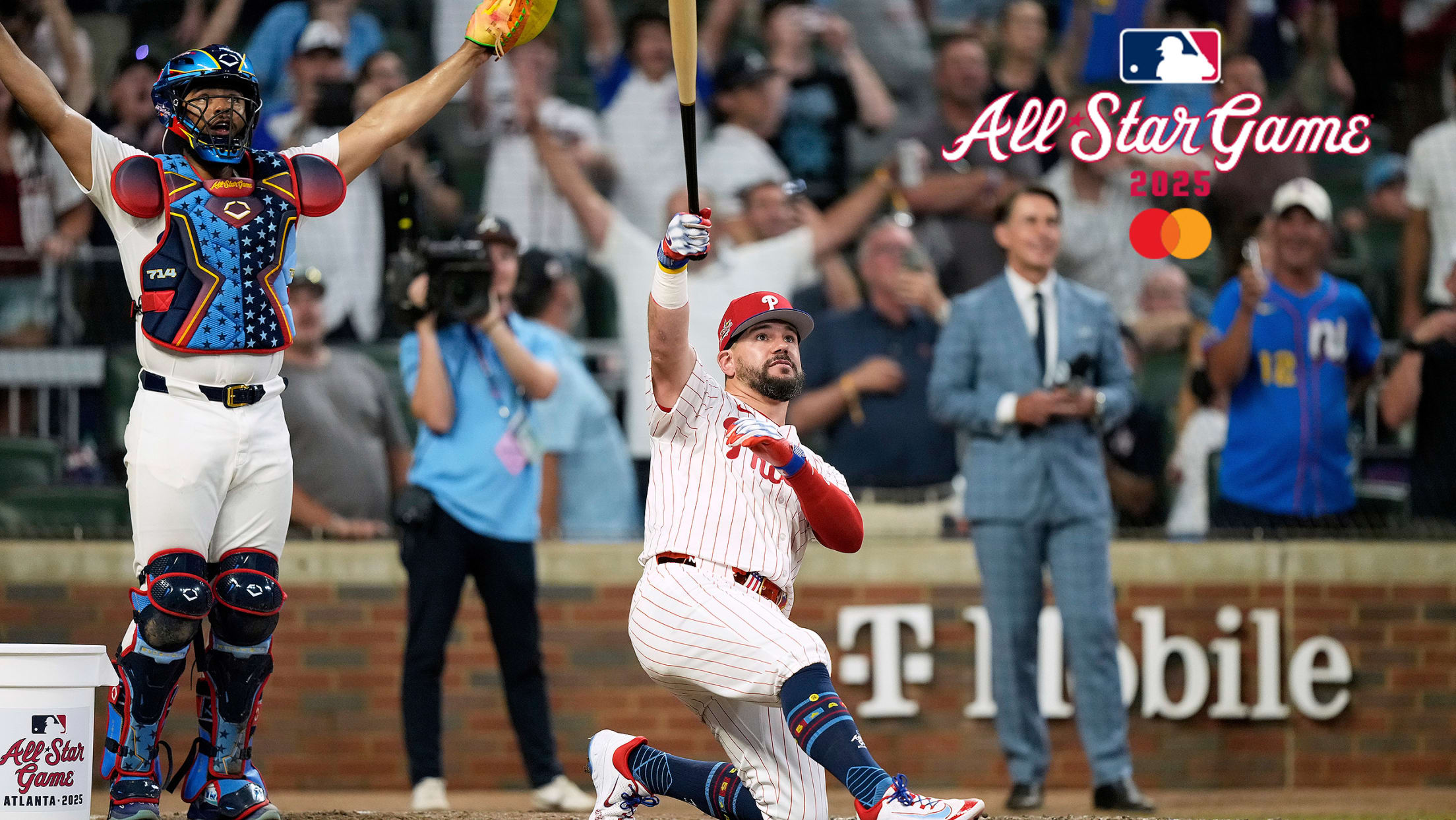 Kyle Schwarber drops to one knee to watch the flight of his third home run in the swing-off