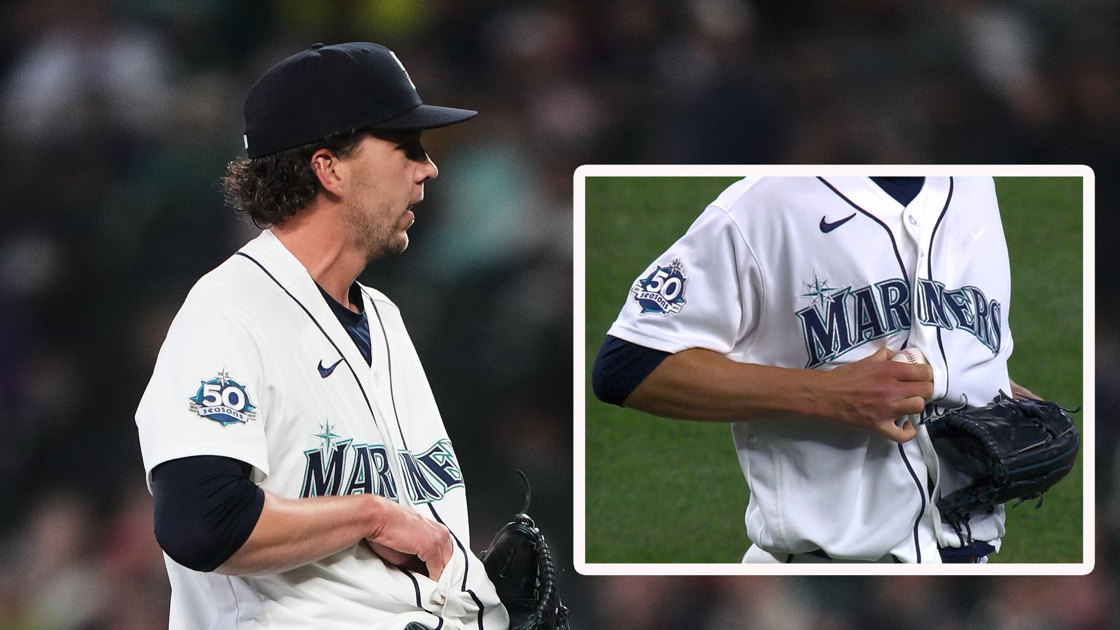 Logan Gilbert removes a ball from his jersey