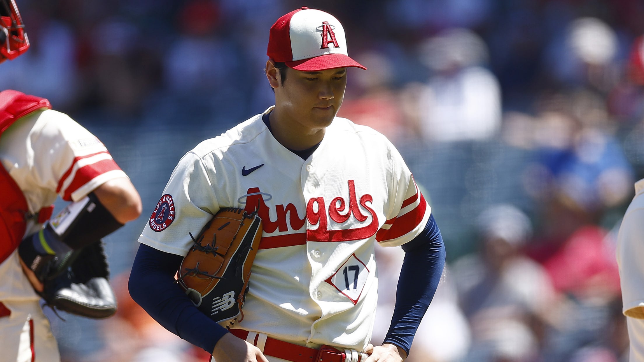 Shohei Ohtani walks off the pitcher's mound