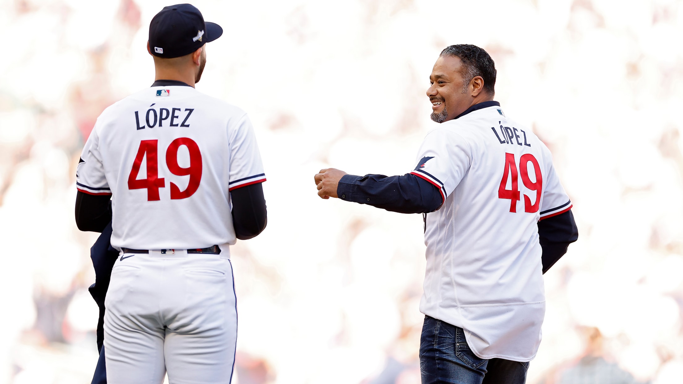 Pablo López and Johan Santana both wear López's jersey in pregame ceremonies