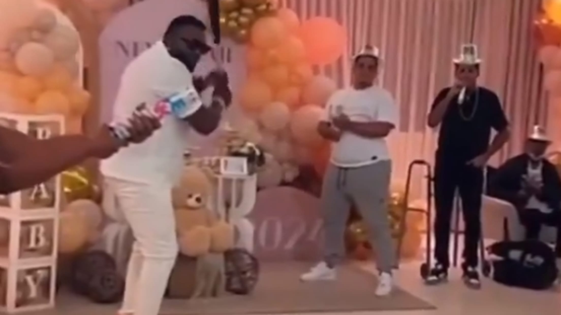 David Ortiz prepares to swing at a gender-reveal party