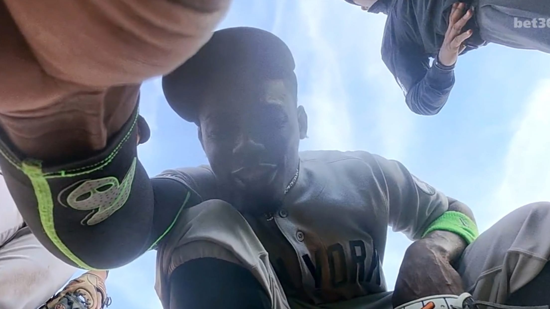 Jazz Chisholm Jr. looks into a camera buried in the infield dirt