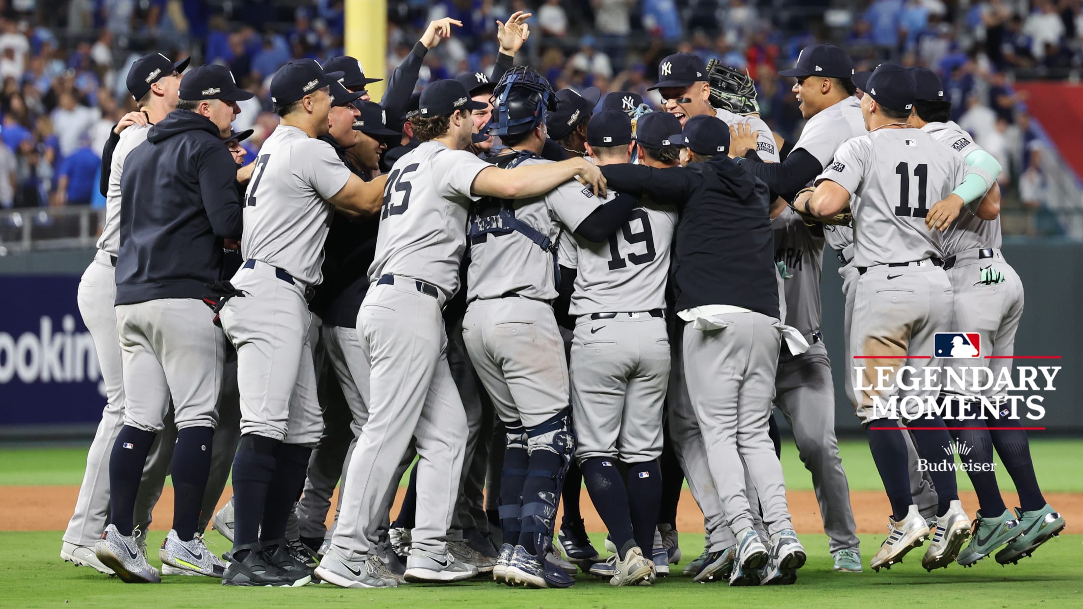 The Yankees celebrate after the last out in Kansas City