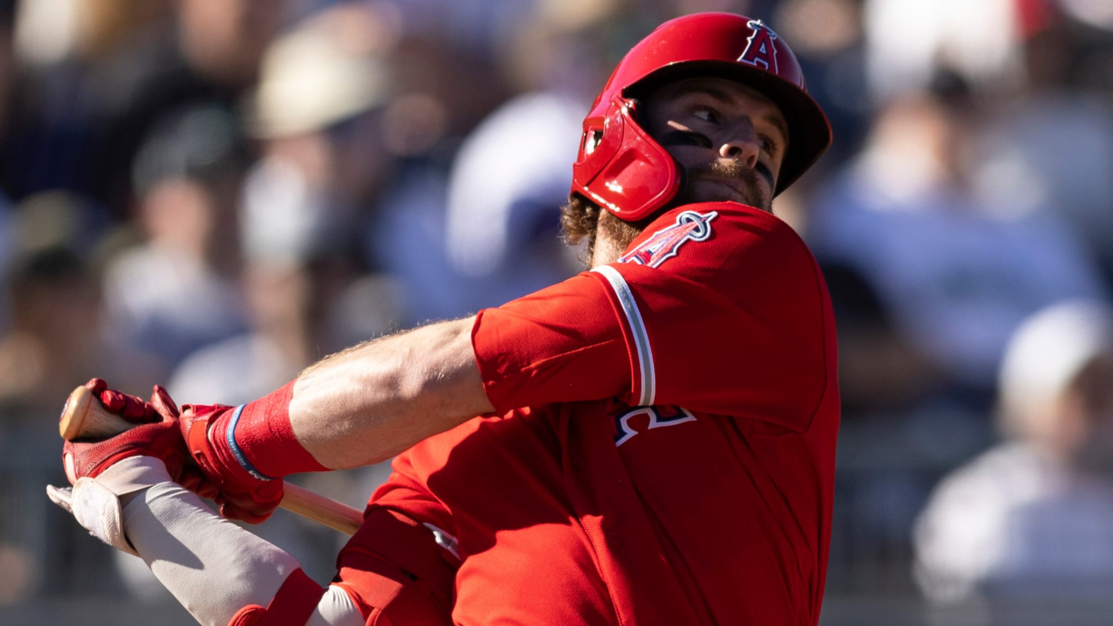 Trey Cabbage follows through on a swing