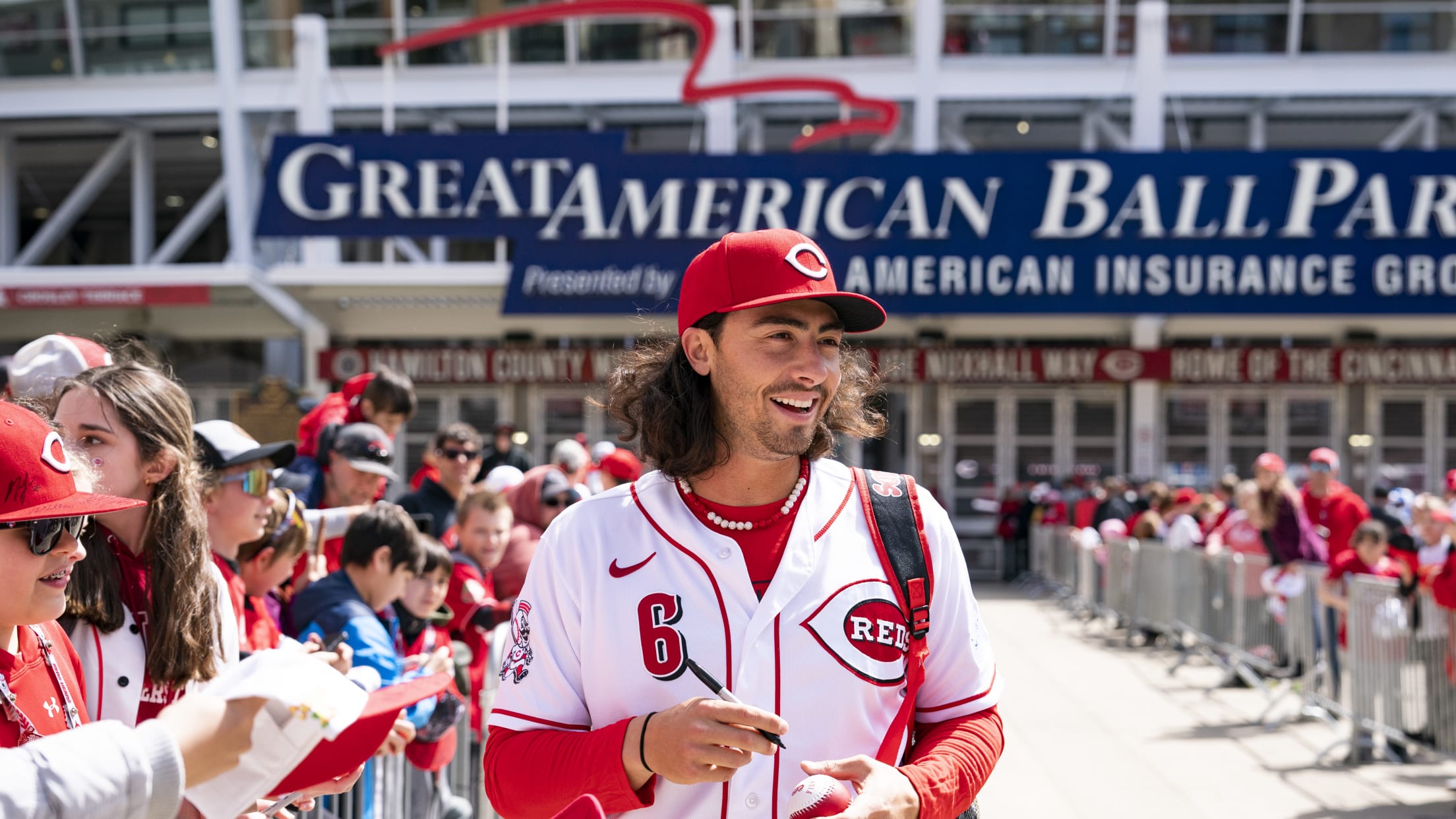 Reds players greet kids and sign autographs on Kids Opening Day