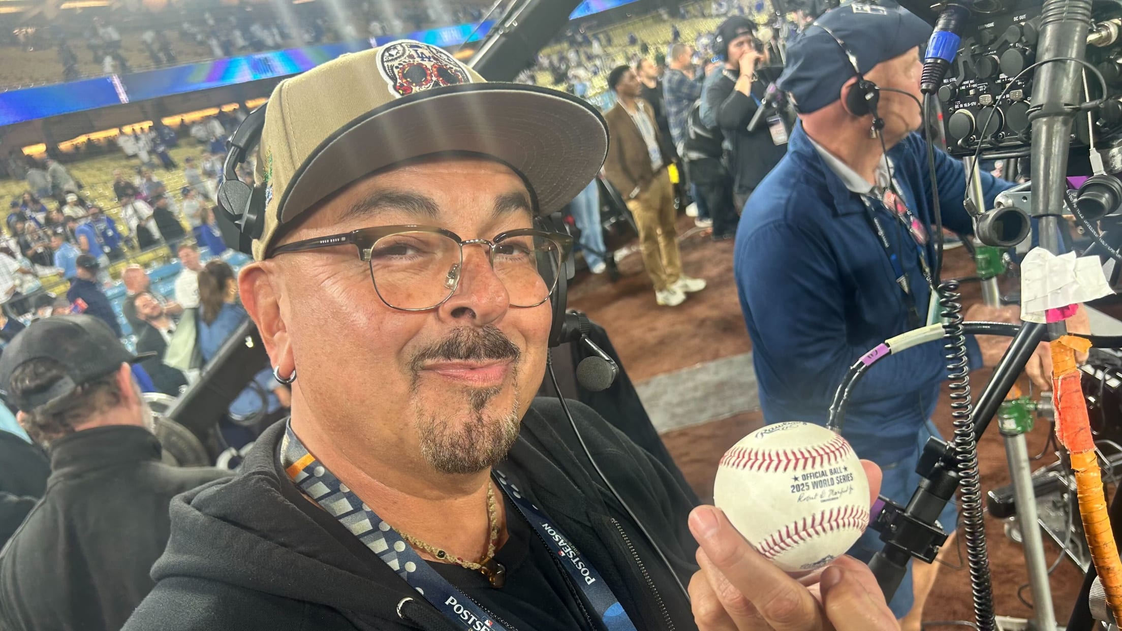 Zeke Hernandez holds the baseball from Freddie Freeman's walk-off home run