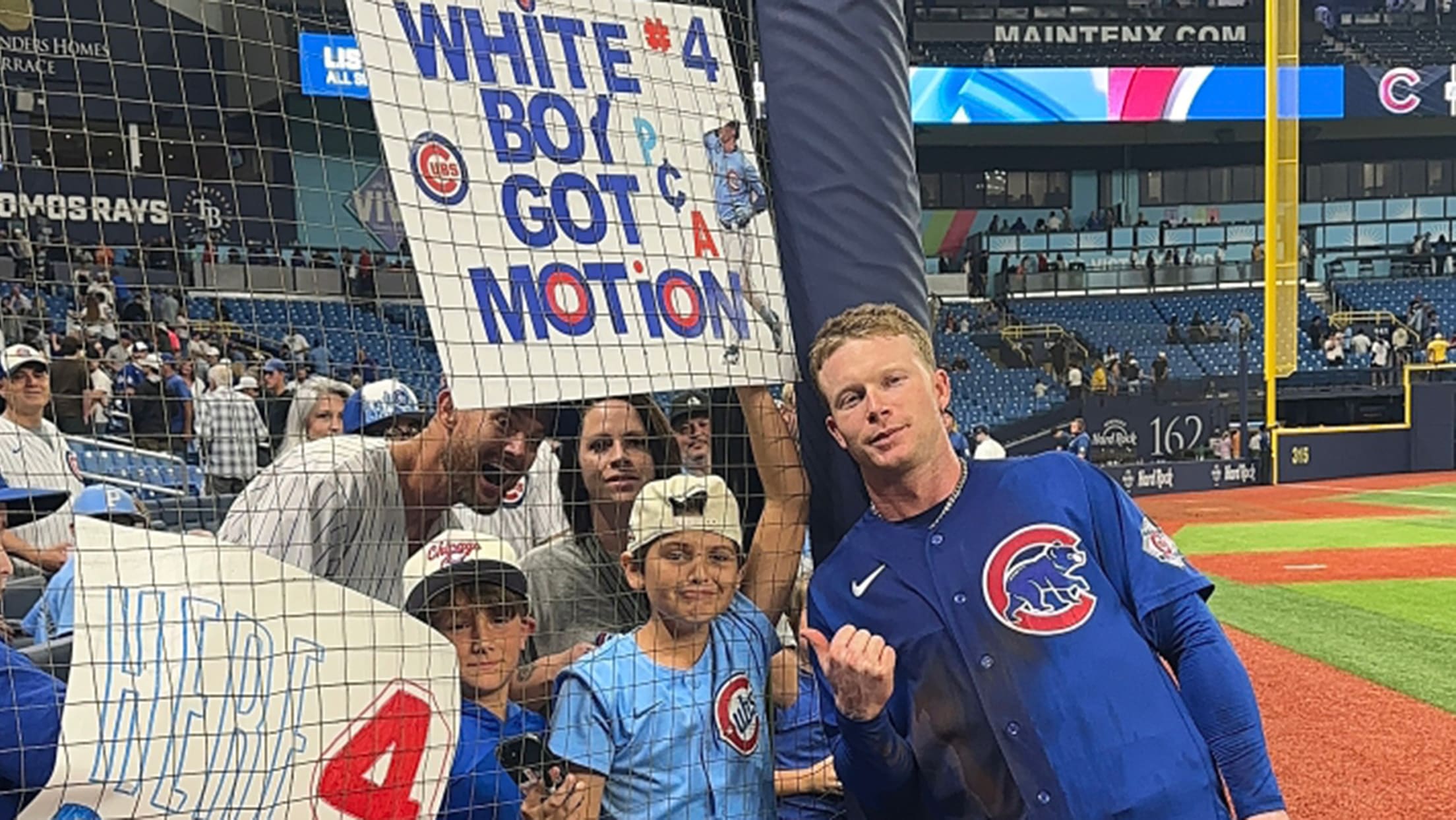 Pete Crow-Armstrong poses for a pic with a young fan