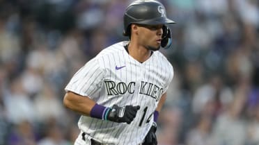 Colorado Rockies' Alan Trejo celebrates as he circles the bases after  hitting a solo walk-off home run against New York Yankees relief pitcher Ron  Marinaccio in the 11th inning of a baseball