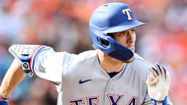 Texas Rangers Rookie Evan Carter Gets First MLB Home Run Ball, Not Sure  Where to Keep It - Sports Illustrated Texas Rangers News, Analysis and More